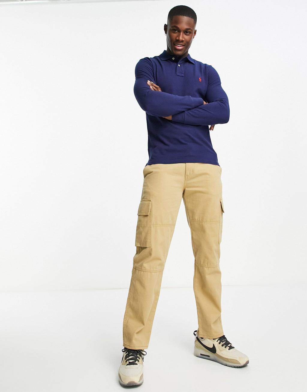 Polo Ralph Lauren icon logo slim fit long sleeve pique polo in navy Product Image