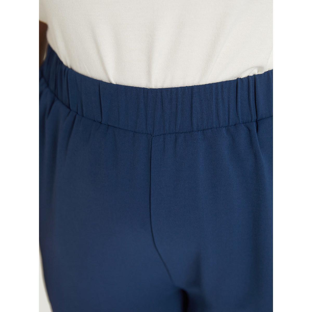 Plus Size Solid Pocker Elastic Waist Laser Cut Pants Women Indigo Casual High Rise Dailywear Pants BloomChic 26/4X Product Image