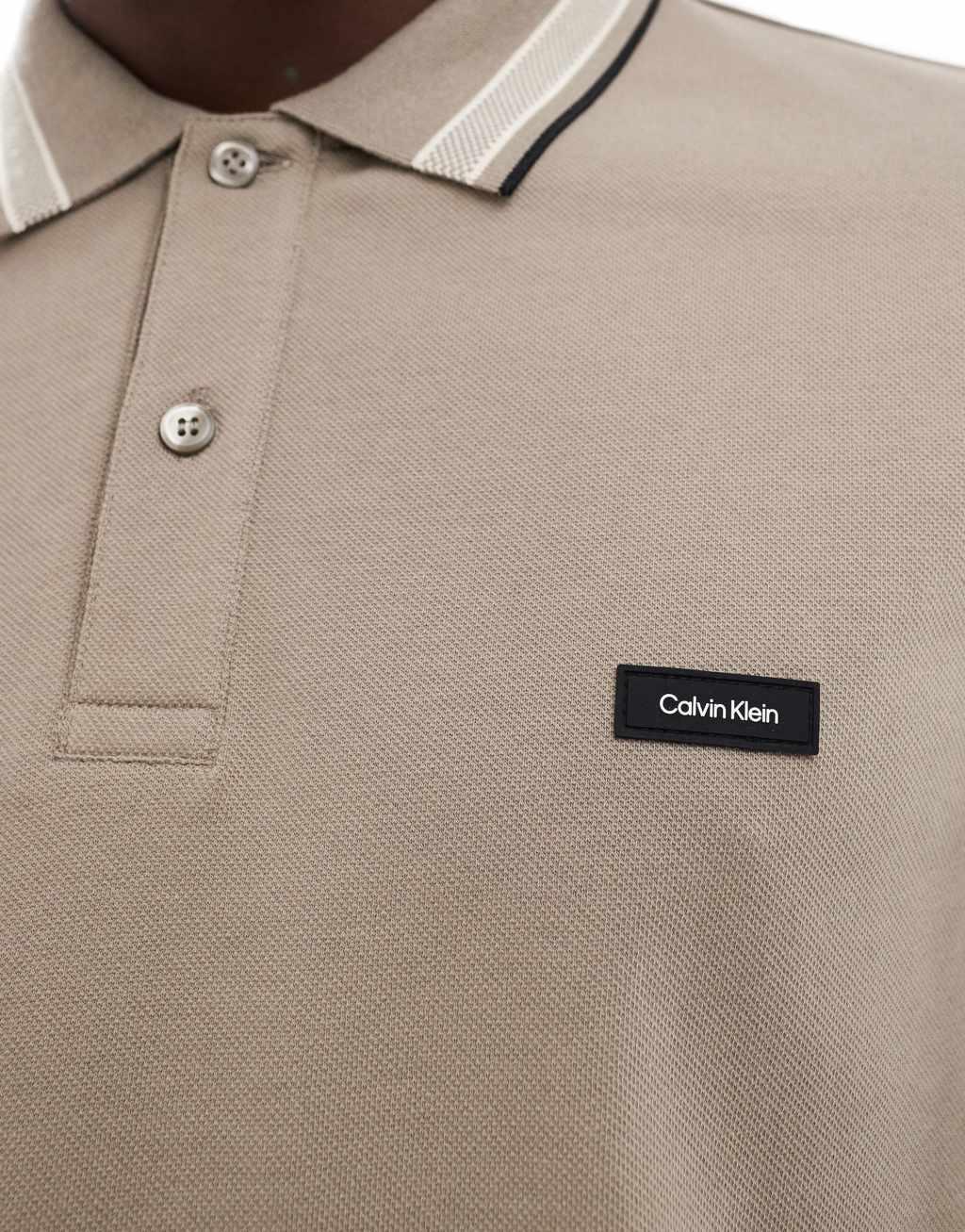 Calvin Klein stretch pique tipped long sleeve polo shirt in beige Product Image