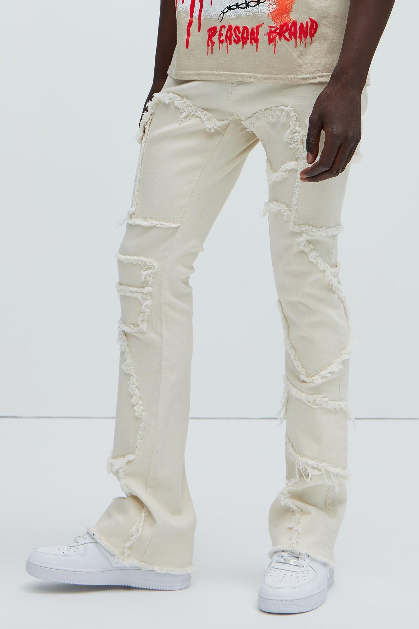 Trapping Frayed Stacked Skinny Flare Pants - Off White Product Image