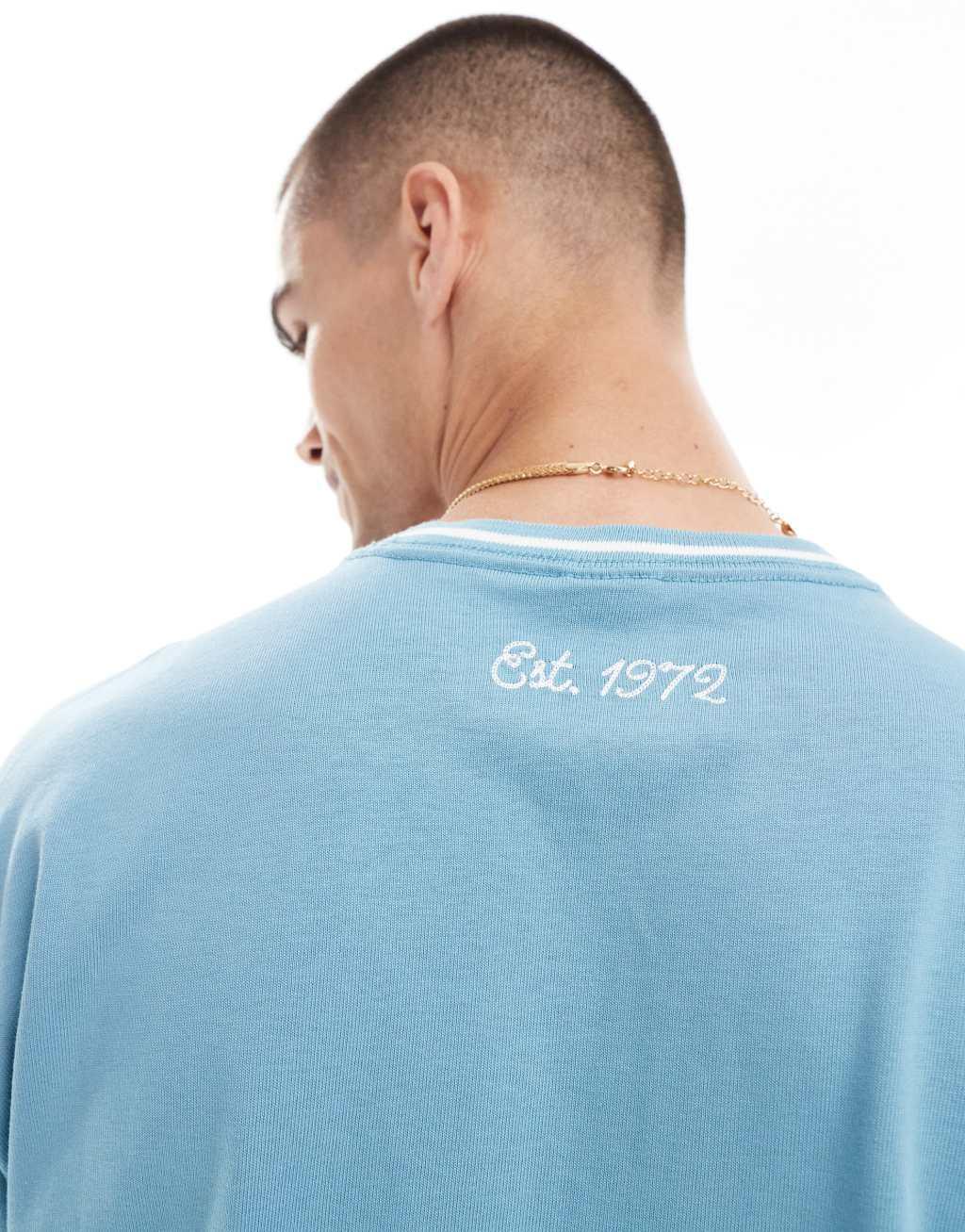 Nike Swoosh overlay logo t-shirt in blue Product Image
