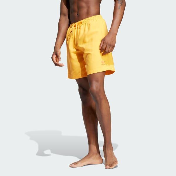 adidas Adicolor 8-Inch Swim Shorts Real Gold M Mens Product Image