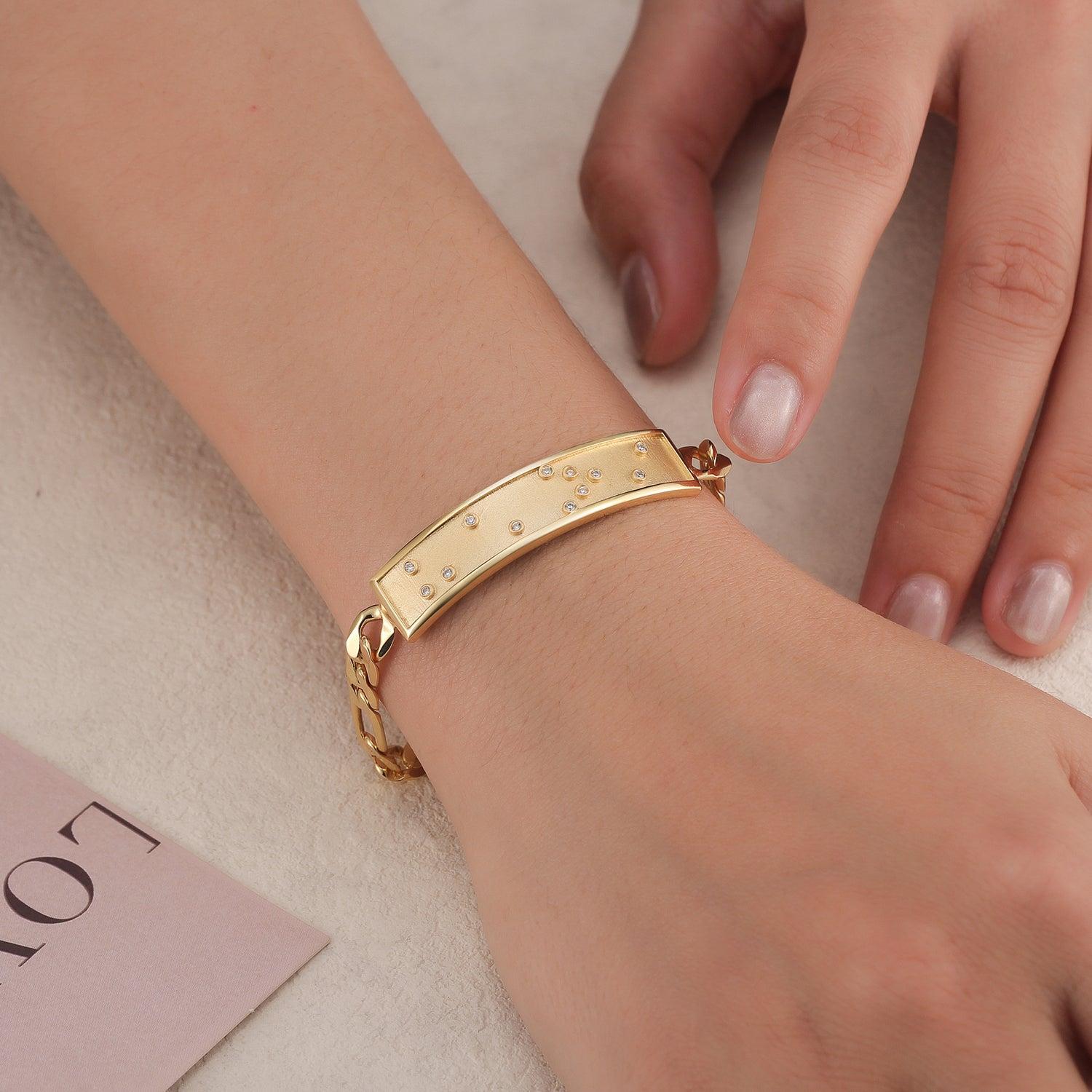 Touchstone HE>i ID Link Bracelet in Gold Product Image