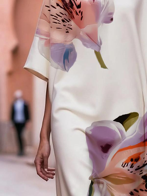 Loose Short Sleeves Asymmetric Floral Printed Split-Joint Round-Neck Midi Dresses Product Image