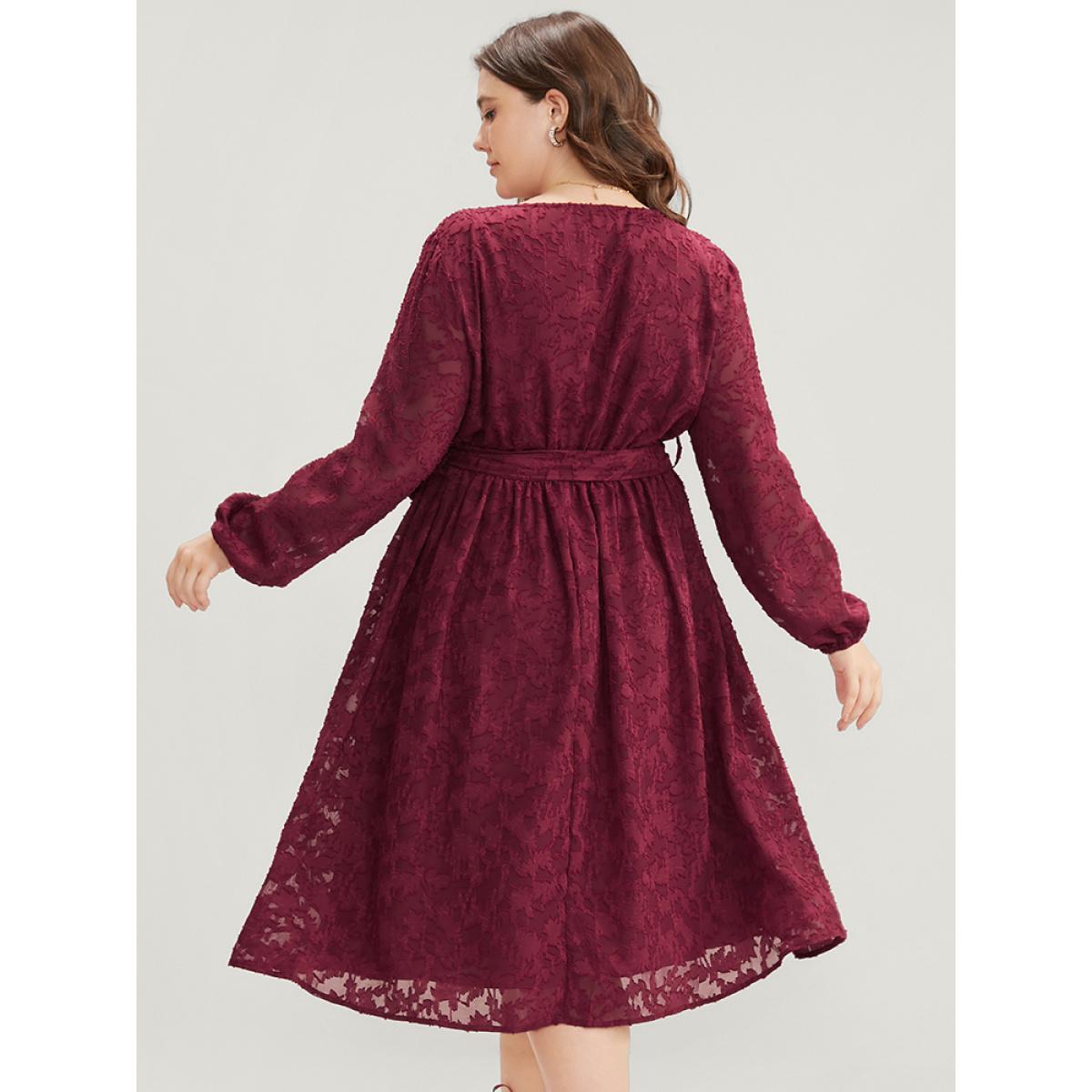 Plus Size Floral Pocket Lantern Sleeve Belted Surplice Neck Dress Scarlet Women Glamour Belted V-neck Long Sleeve Curvy Midi Dress BloomChic 26/4X Product Image