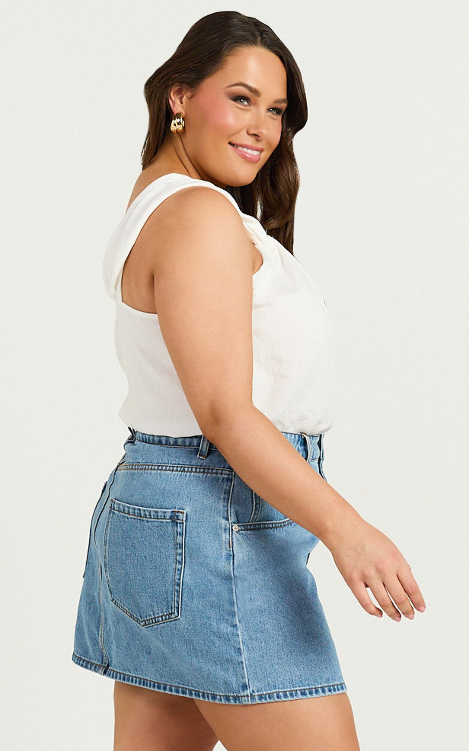 Jaden Mini Skirt - High Waisted Recycled Denim Mini Skirt in Mid Blue Wash Product Image