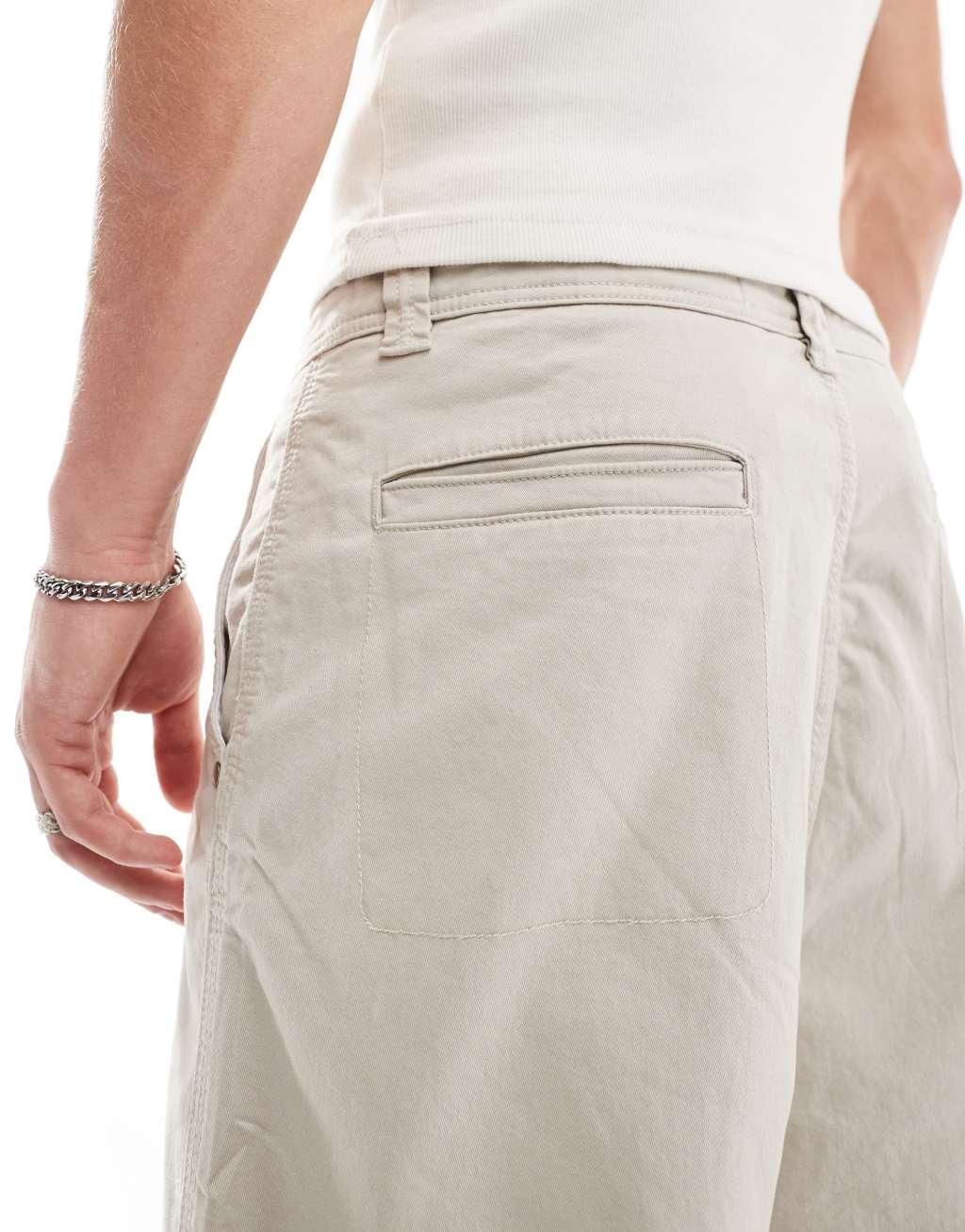 Bershka skater carpenter shorts in sand Product Image