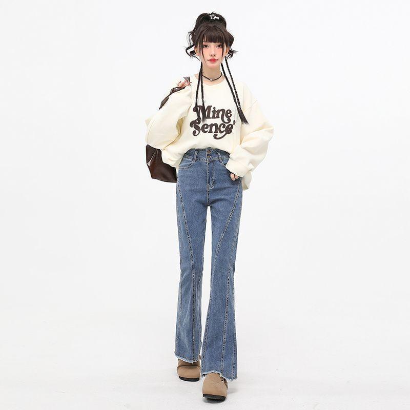 High Rise Fringed Hem Flared Jeans Product Image