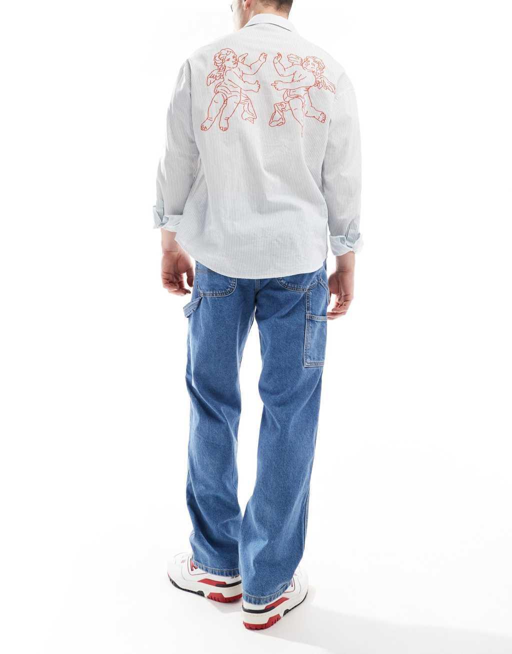 Jack & Jones Eddie loose carpenter jeans in mid wash blue Product Image