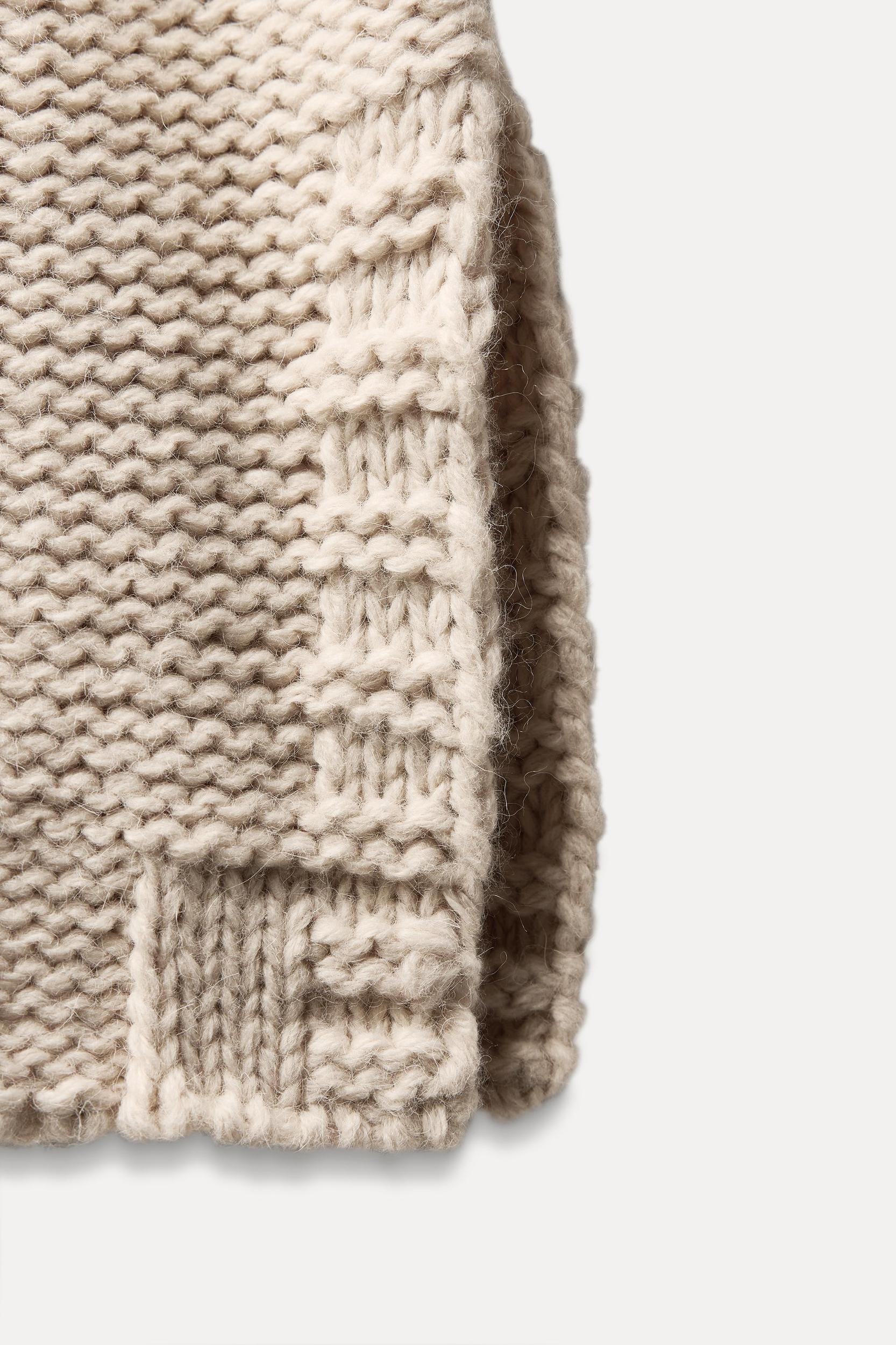 CABLE KNIT SWEATER Product Image