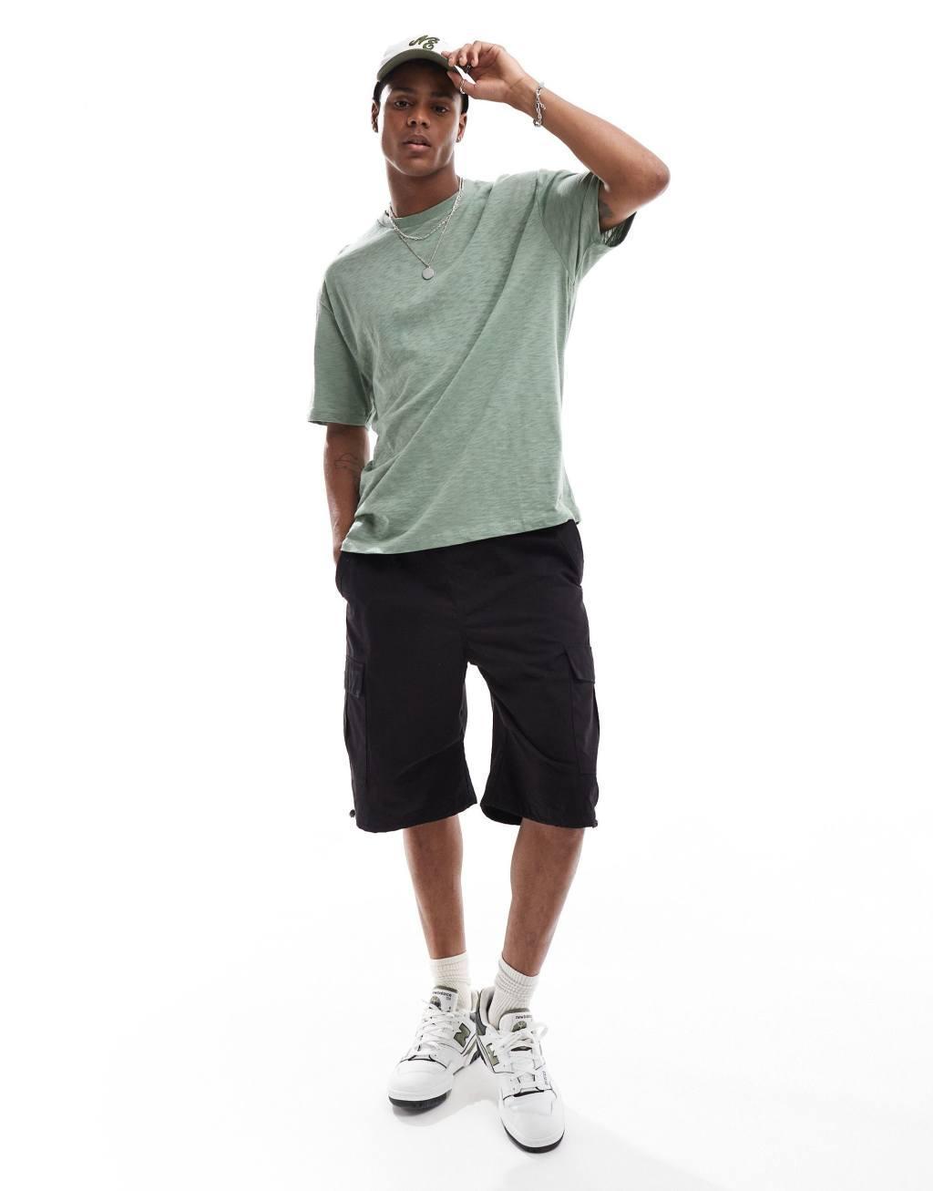 ASOS DESIGN relaxed t-shirt in green fabric with celestial back print Product Image