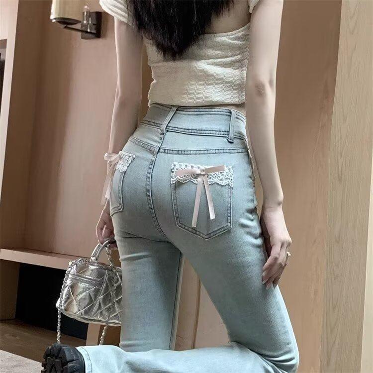 High Waist Washed Bow Lace Trim Flared Jeans Product Image