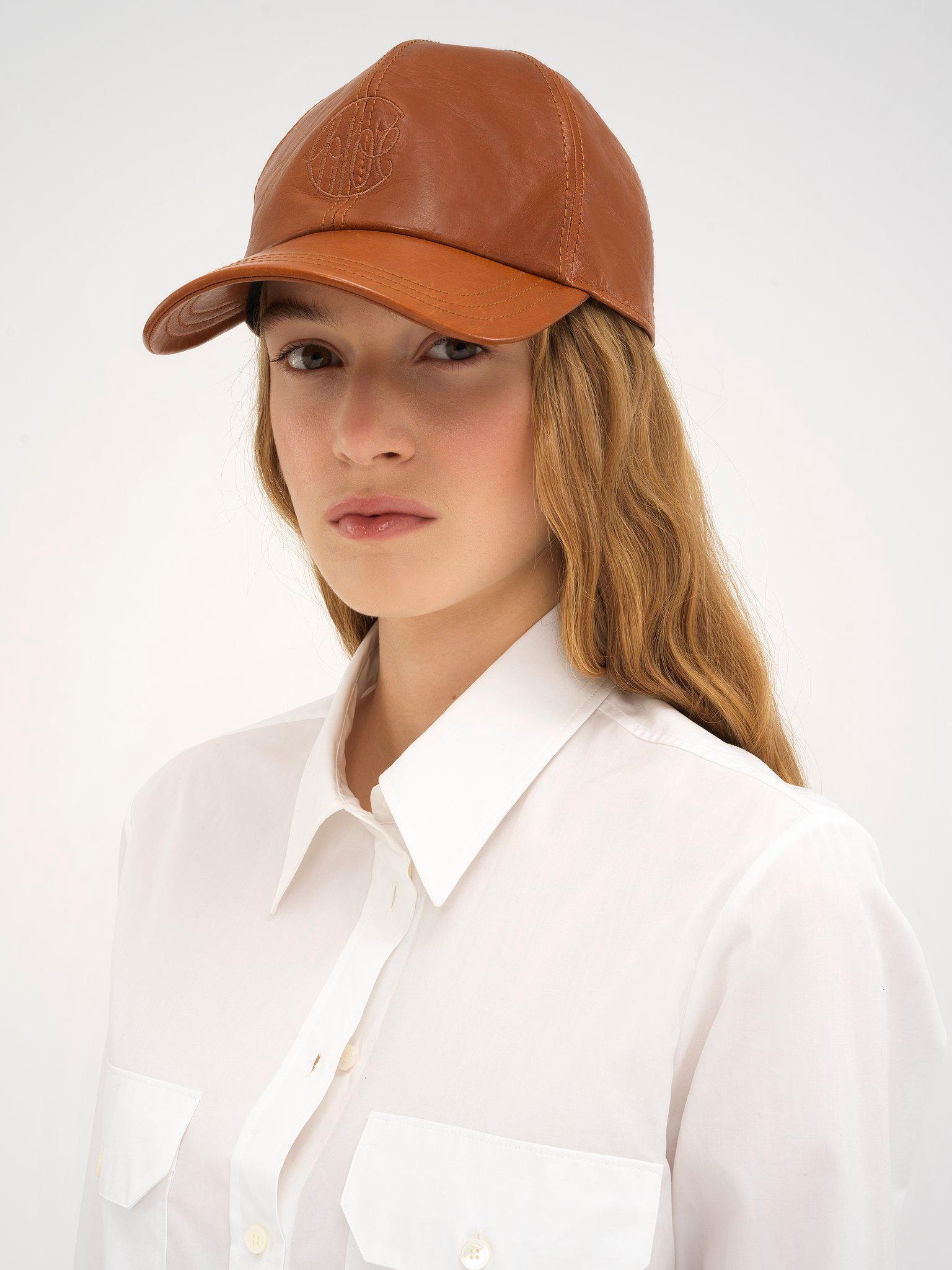 Swing cap in shiny leather Product Image