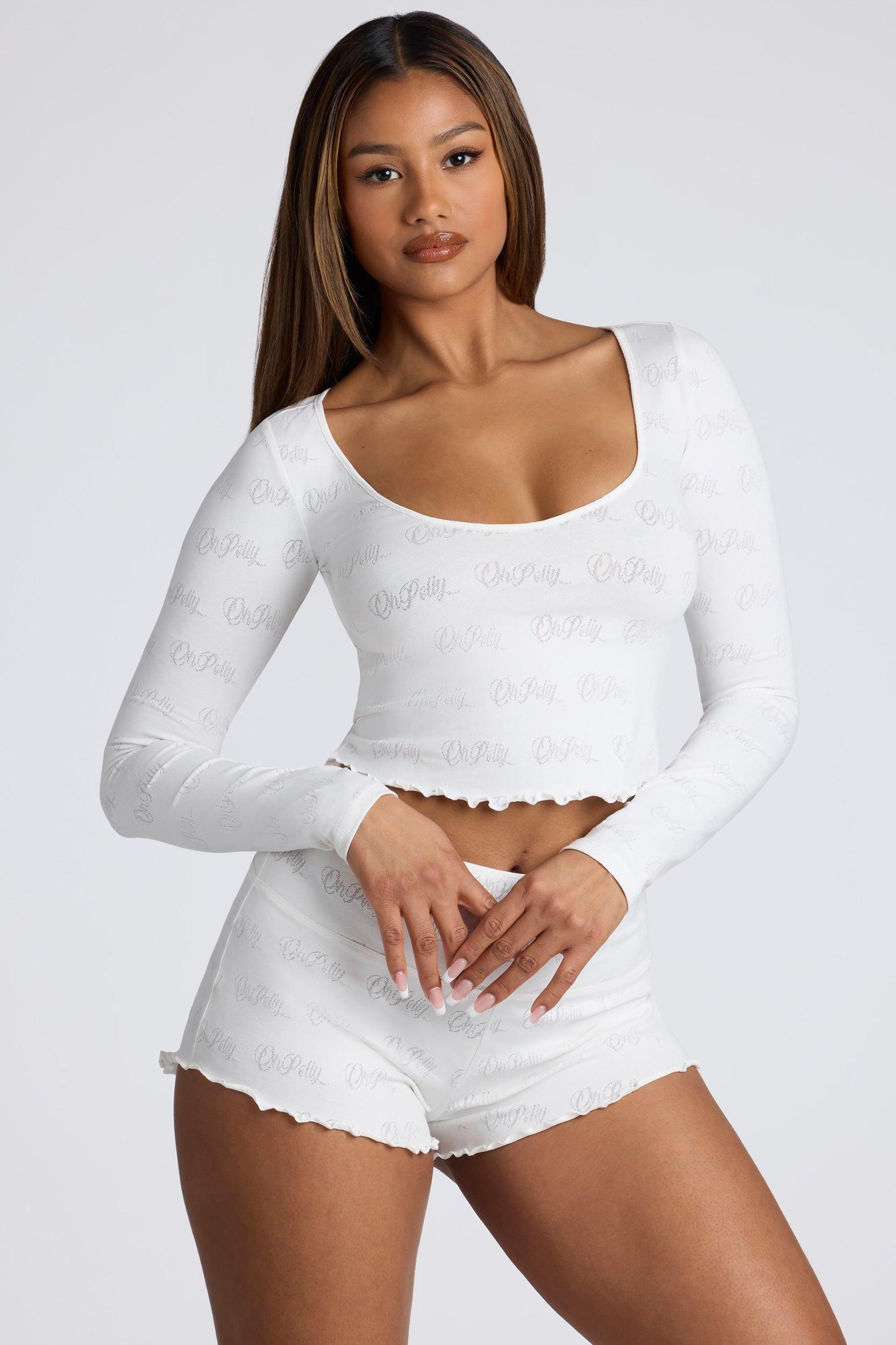 Long Sleeve Scoop Neck Pointelle Crop Top in White Product Image