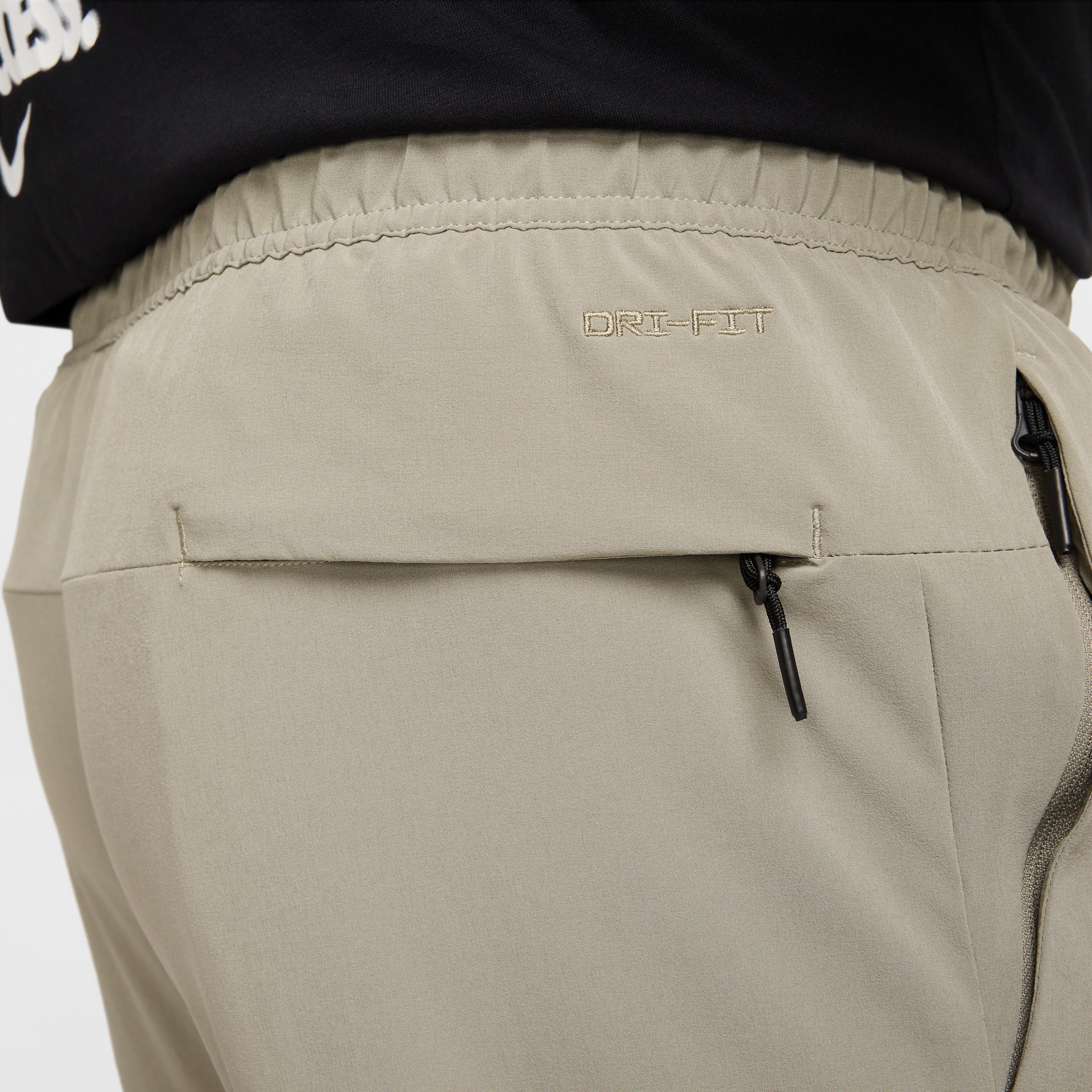 Nike Unlimited Men's Dri-FIT Zippered Cuff Versatile Pants Product Image