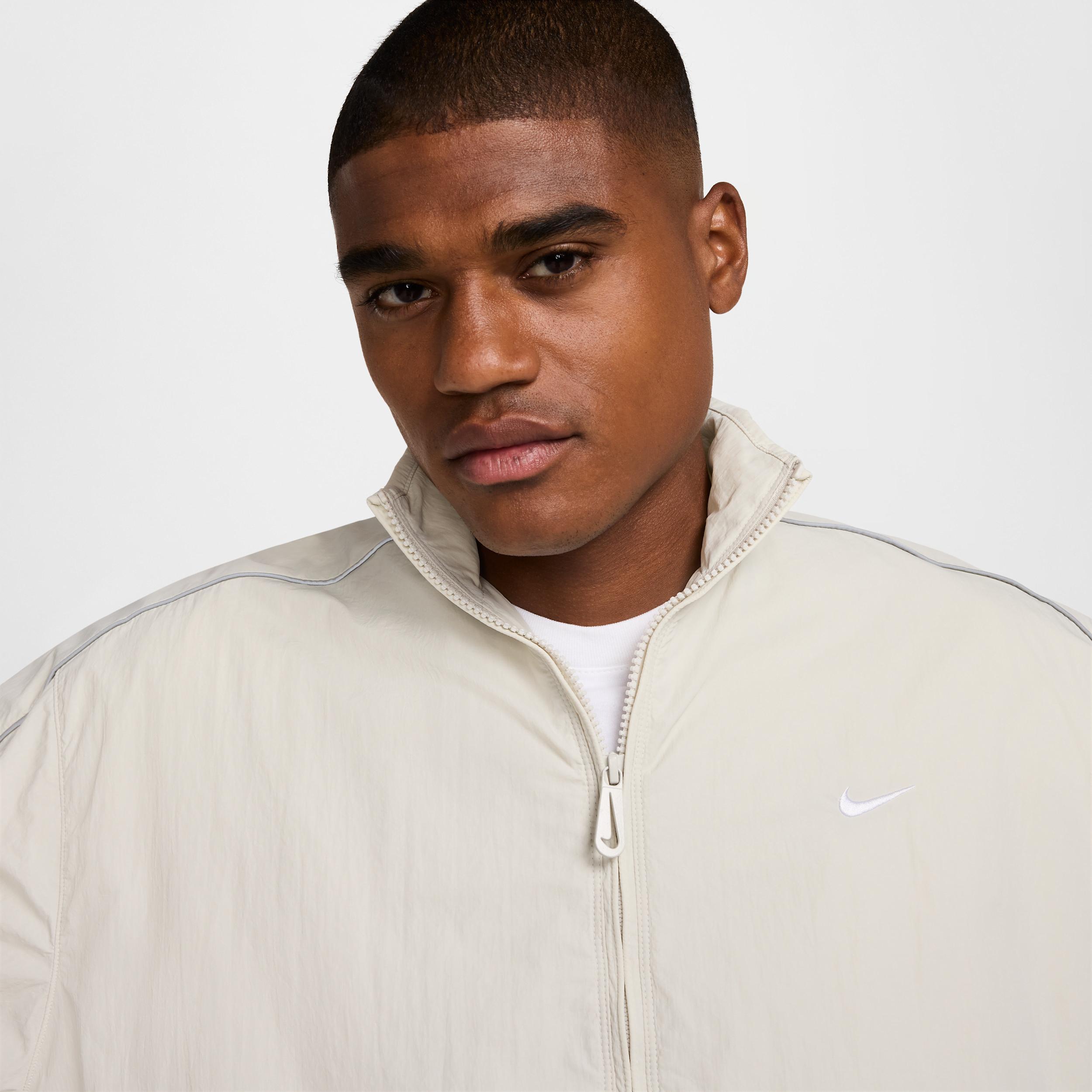 Men's Nike Sportswear Solo Swoosh Woven Track Jacket Product Image