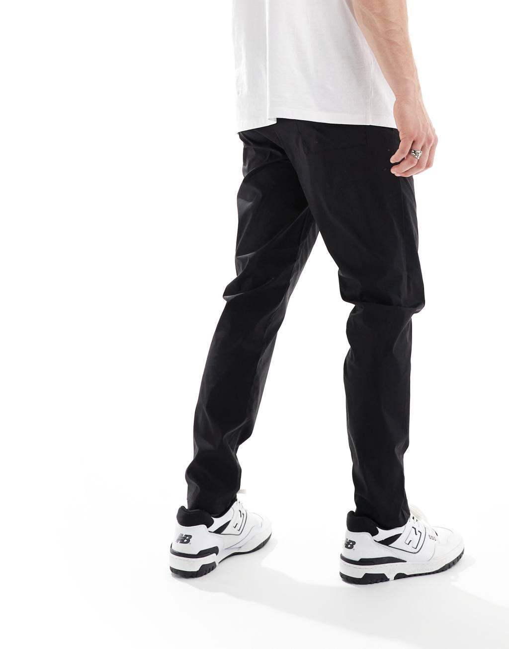 ONLY & SONS pull on tapered fit pants in black Product Image