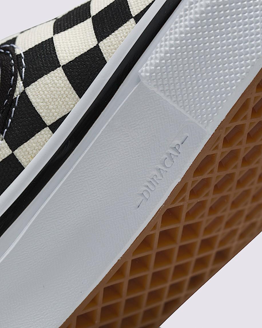 Skate Slip-On Checkerboard Shoe in Black / Off White| Vans US Product Image