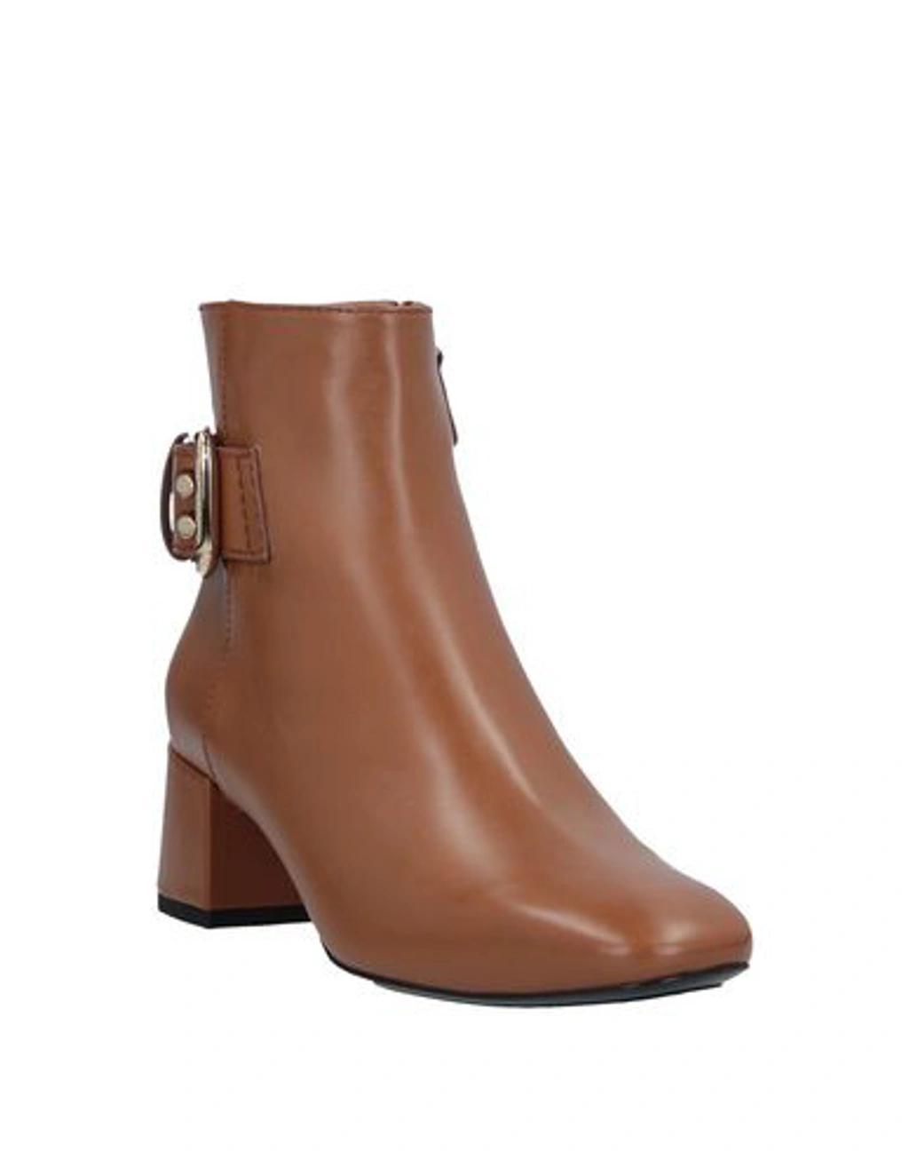 TOD'S Ankle Boots In Brown Product Image