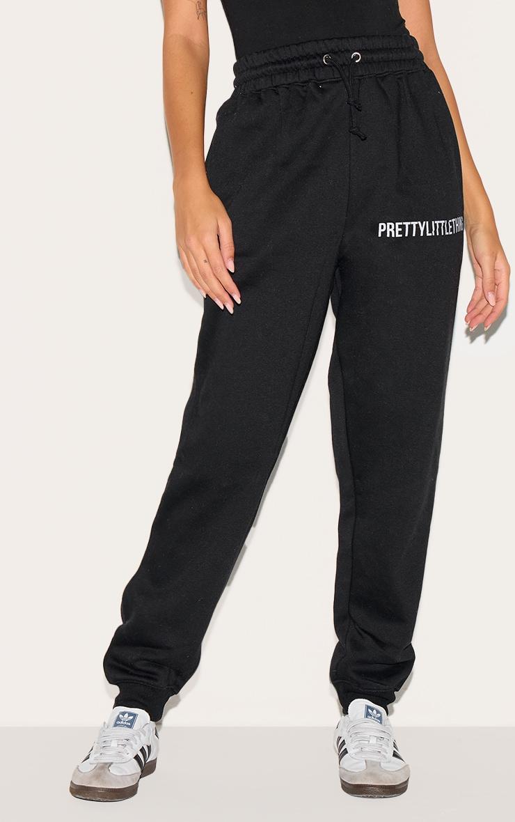 PRETTYLITTLETHING Black Logo High Waisted Cuffed Sweatpants Product Image