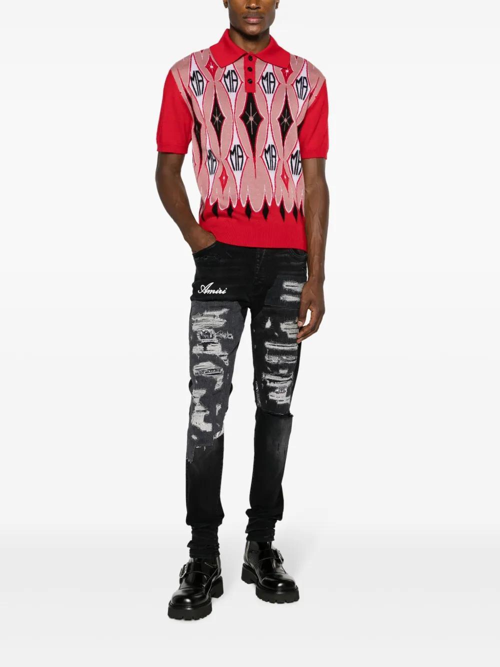 Artisanal distressed slim-fit jeans Product Image