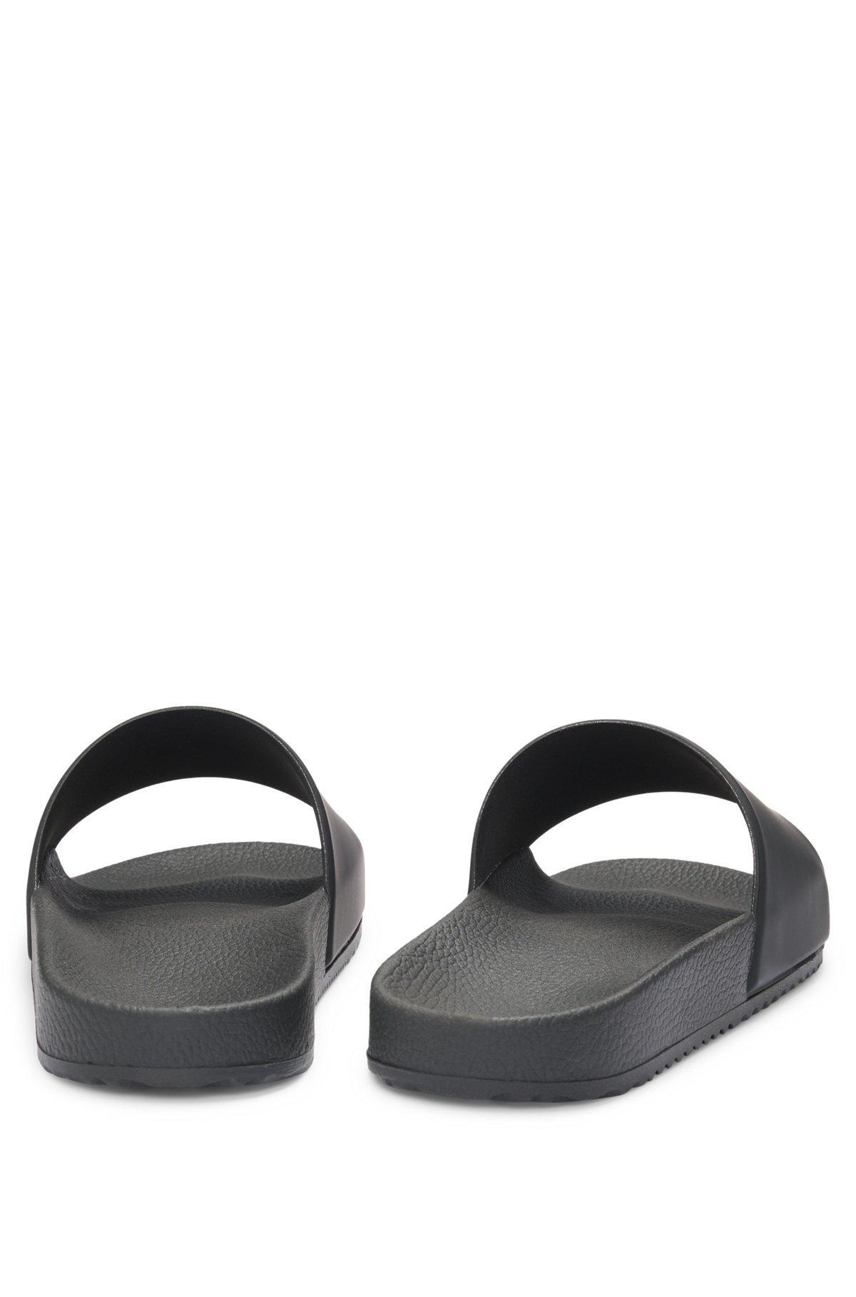 Italian-made slides with logo label Product Image