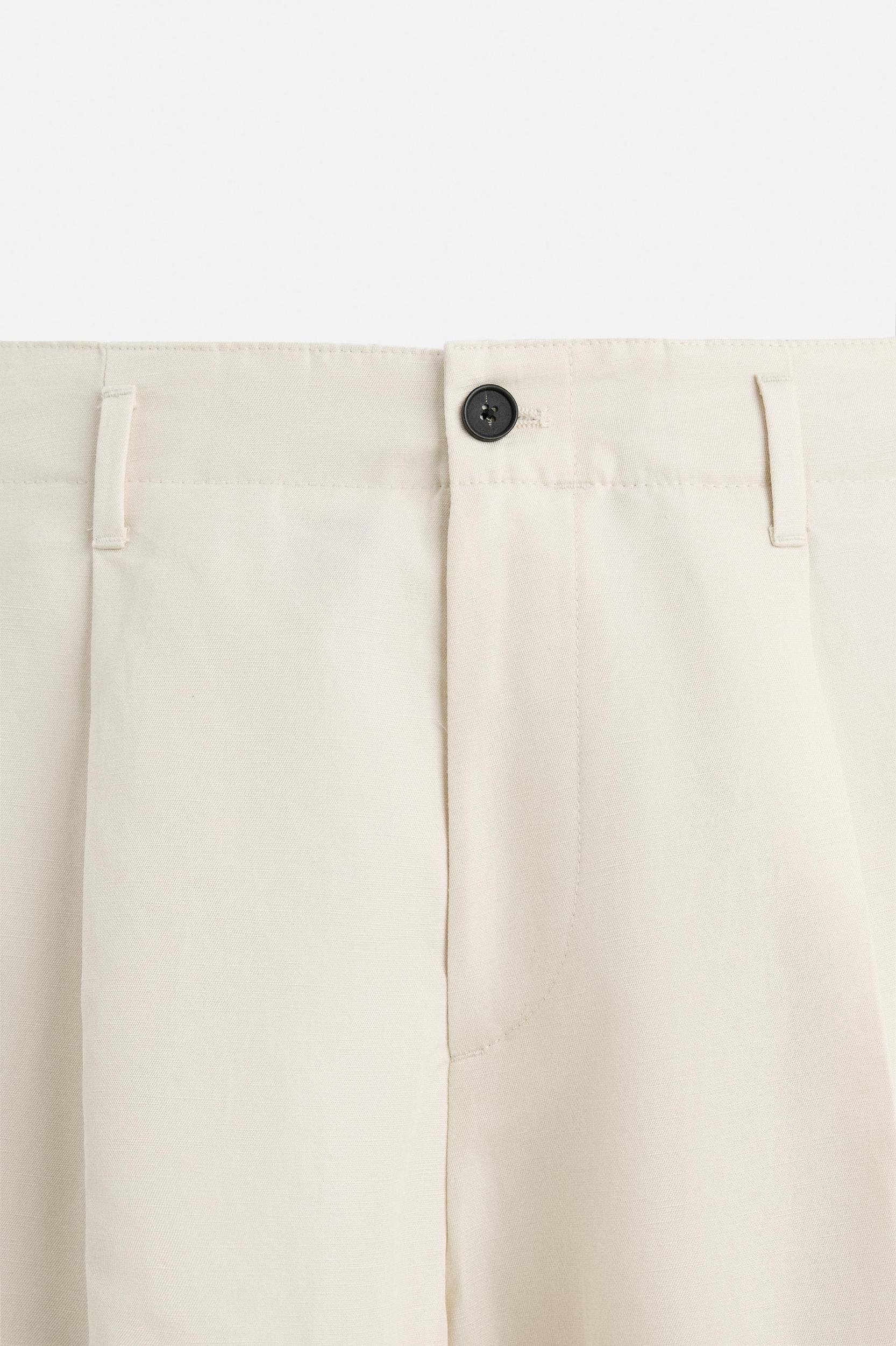 PLEATED SUIT PANTS Product Image