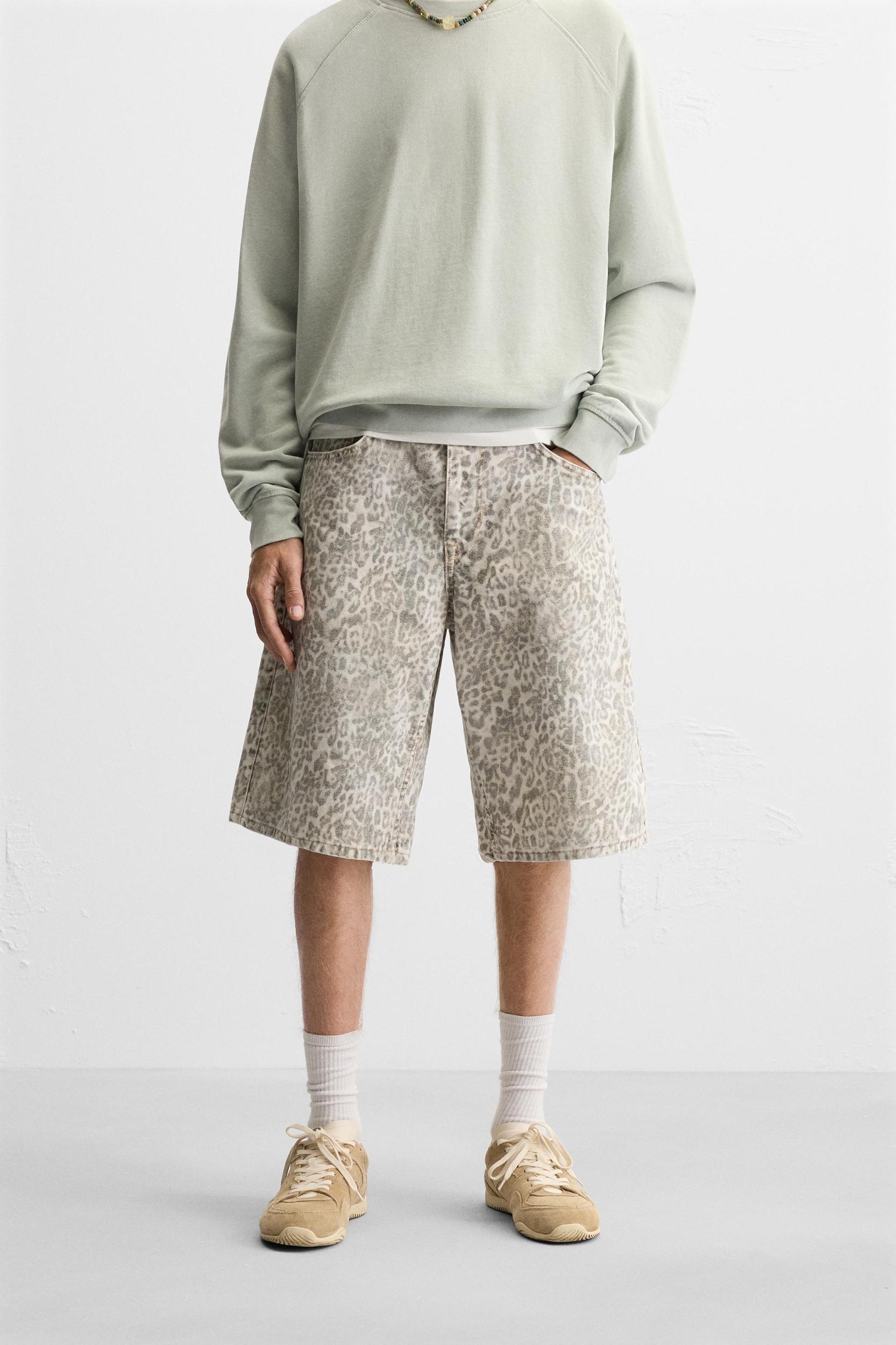 DENIM ANIMAL PRINT SHORTS Product Image