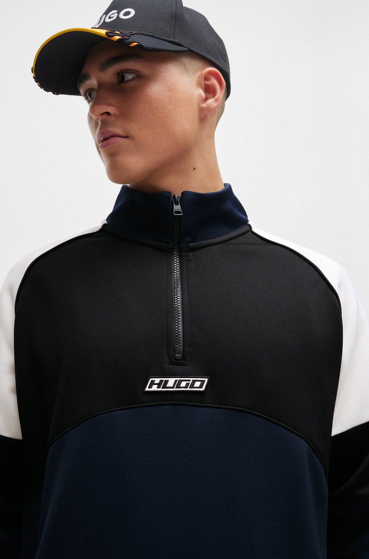 Color-blocked sweatshirt with racing-inspired logo badge Product Image