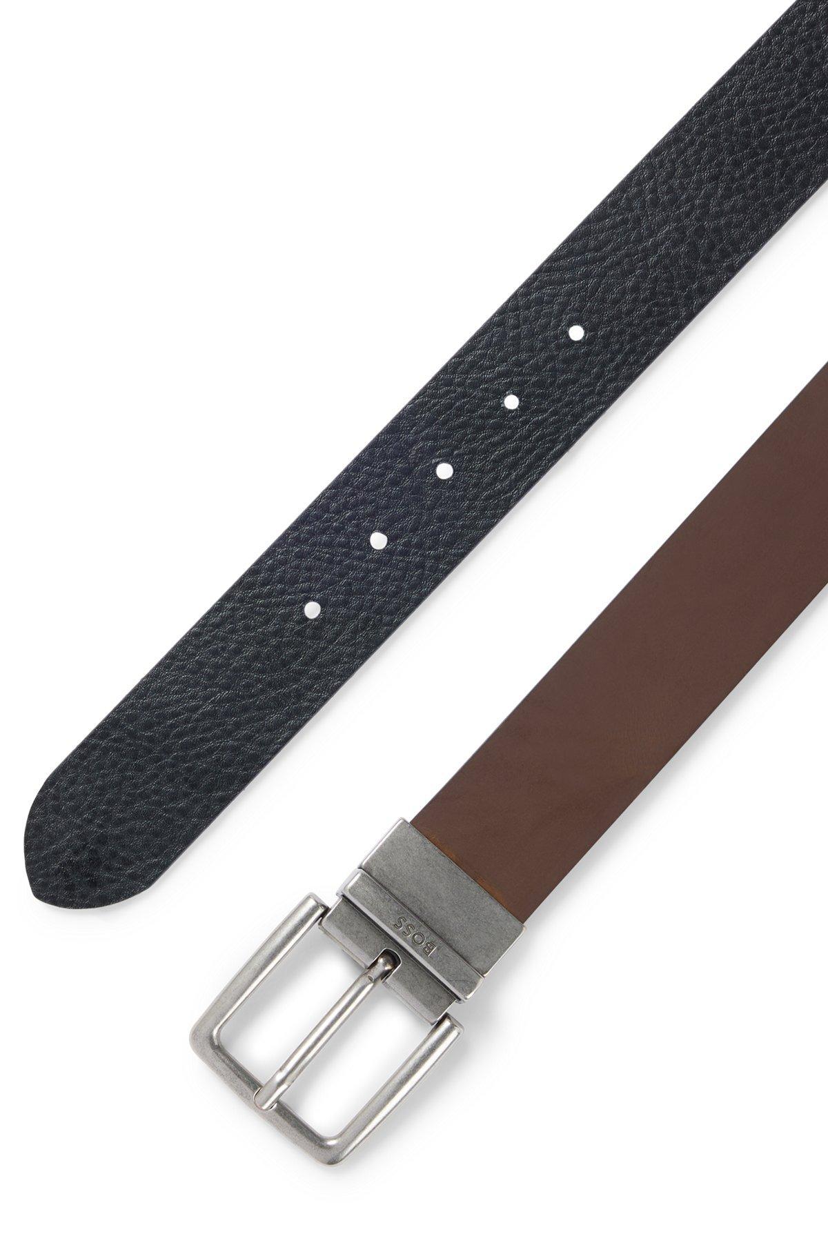 Reversible belt in plain and grained leather Product Image