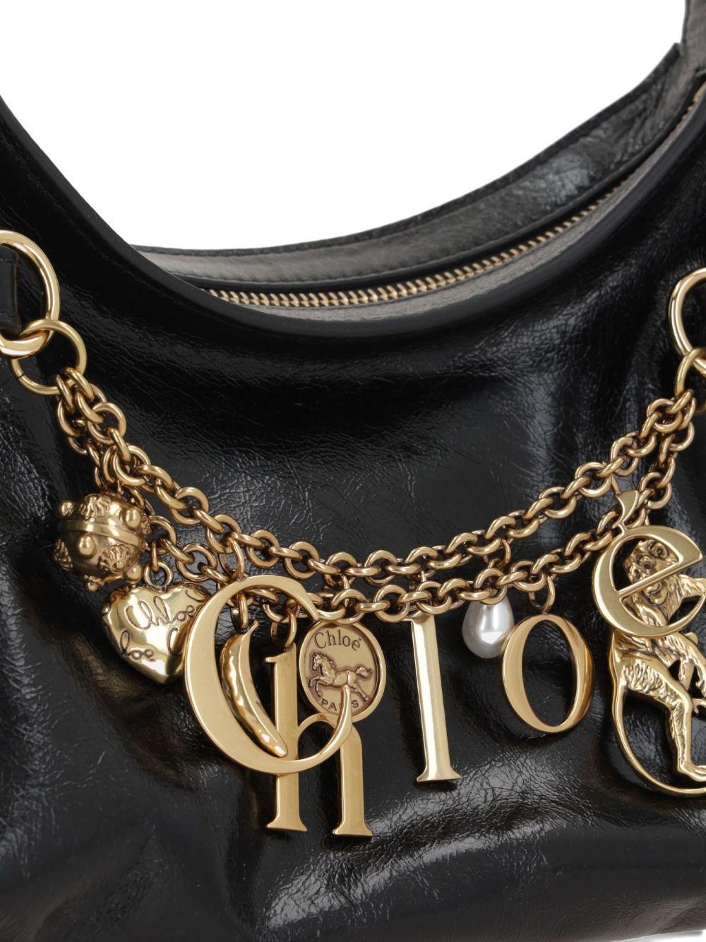 Charms embellished leather shoulder bag Product Image