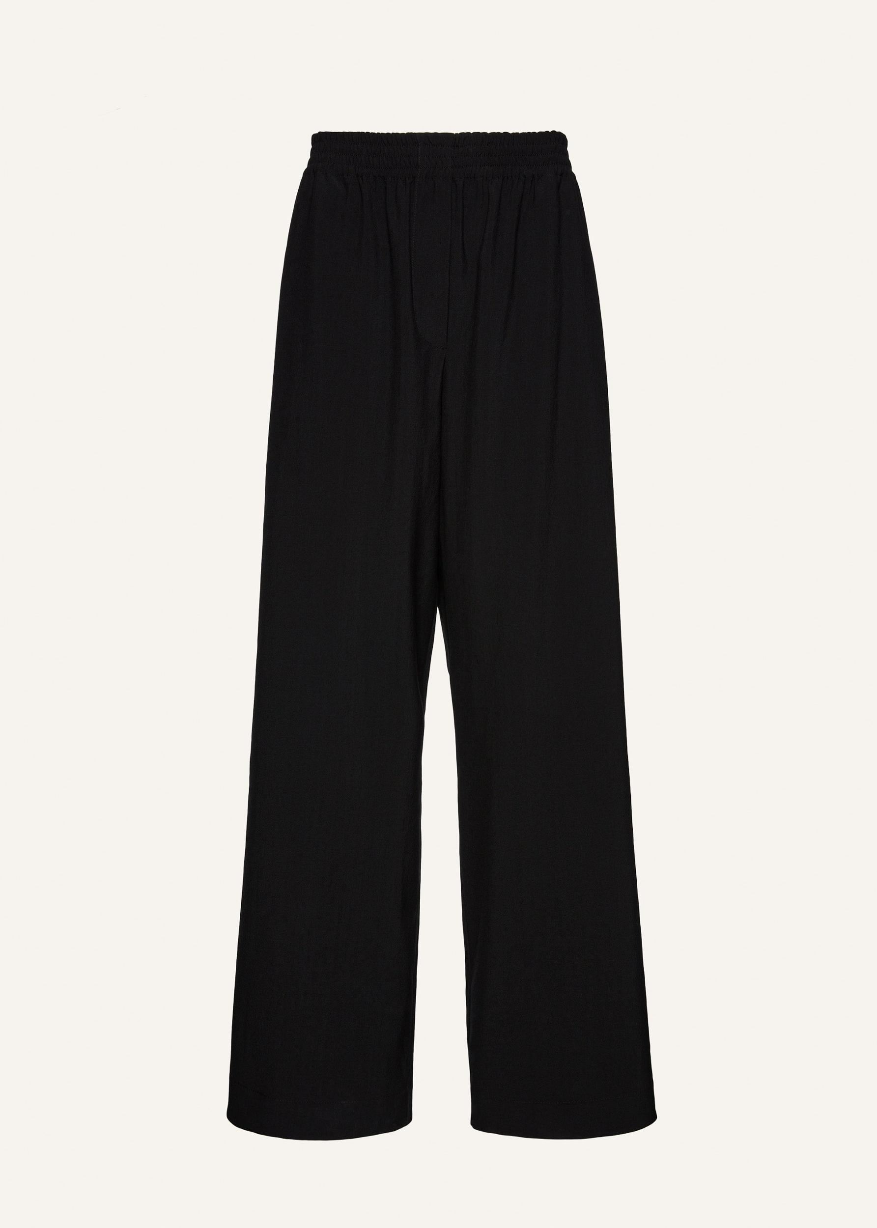 Elastic waistband trousers in black Product Image