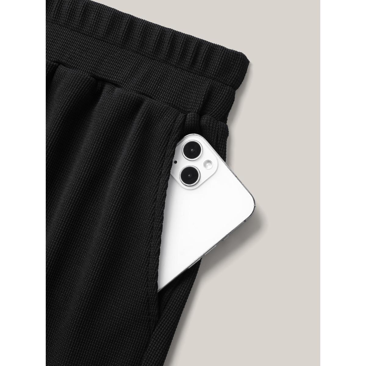Plus Size Textured Tassel Detail Everyday Shorts Women Black Resort Tassels Loose Vacation Shorts BloomChic 28/5X Product Image