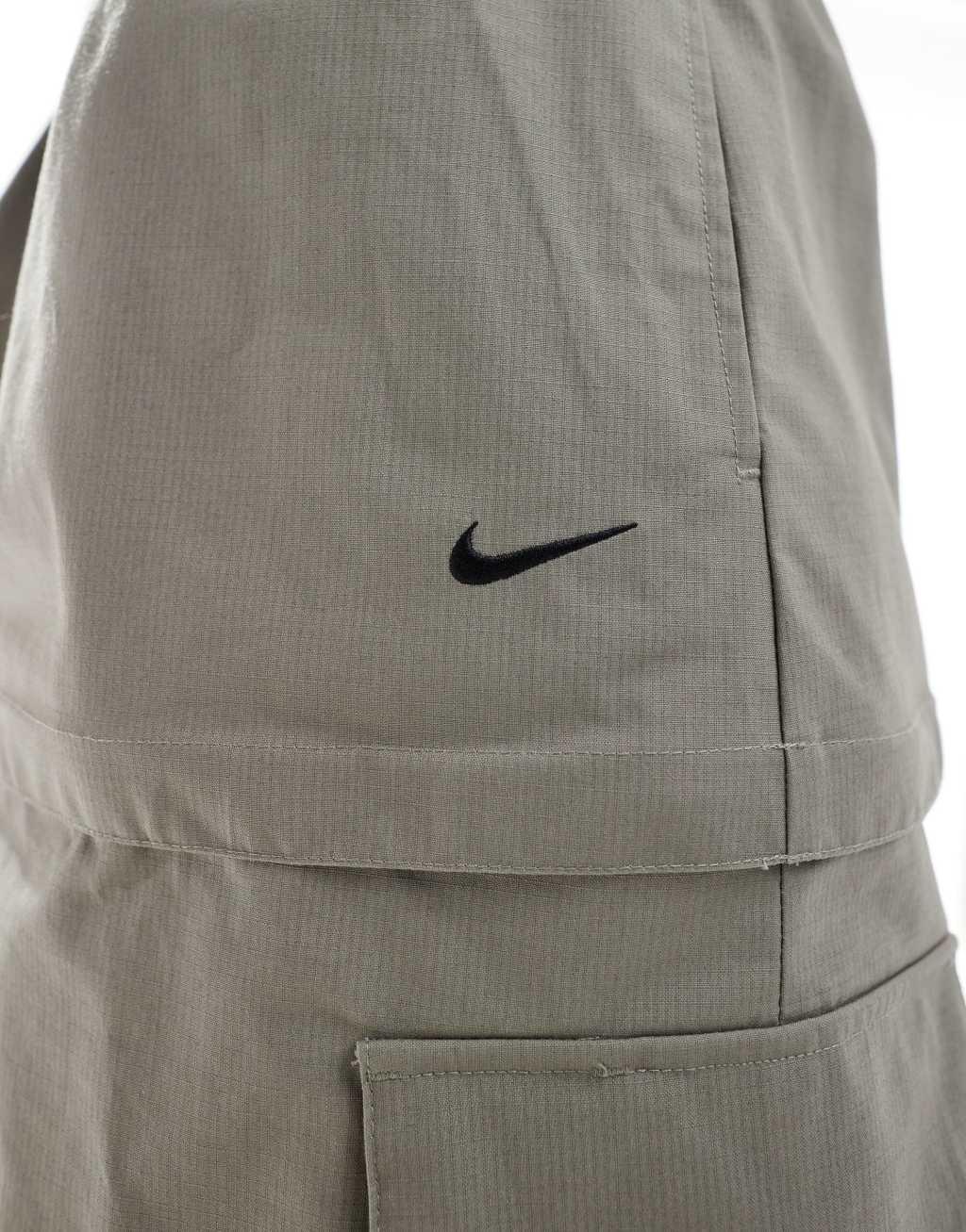 Nike essential cargo midi skirt in gray Product Image