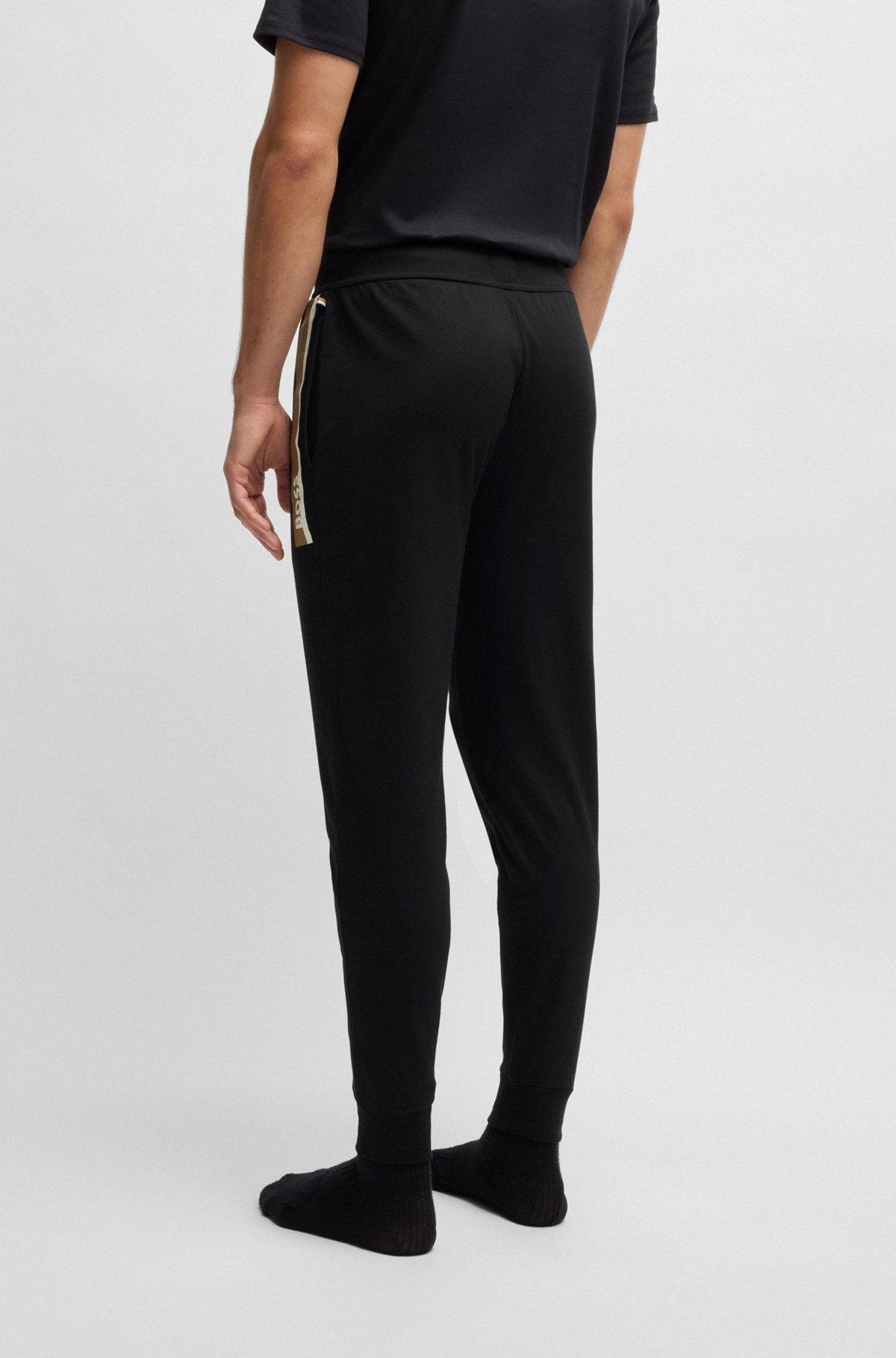 Cotton-terry tracksuit bottoms with stripe print Product Image