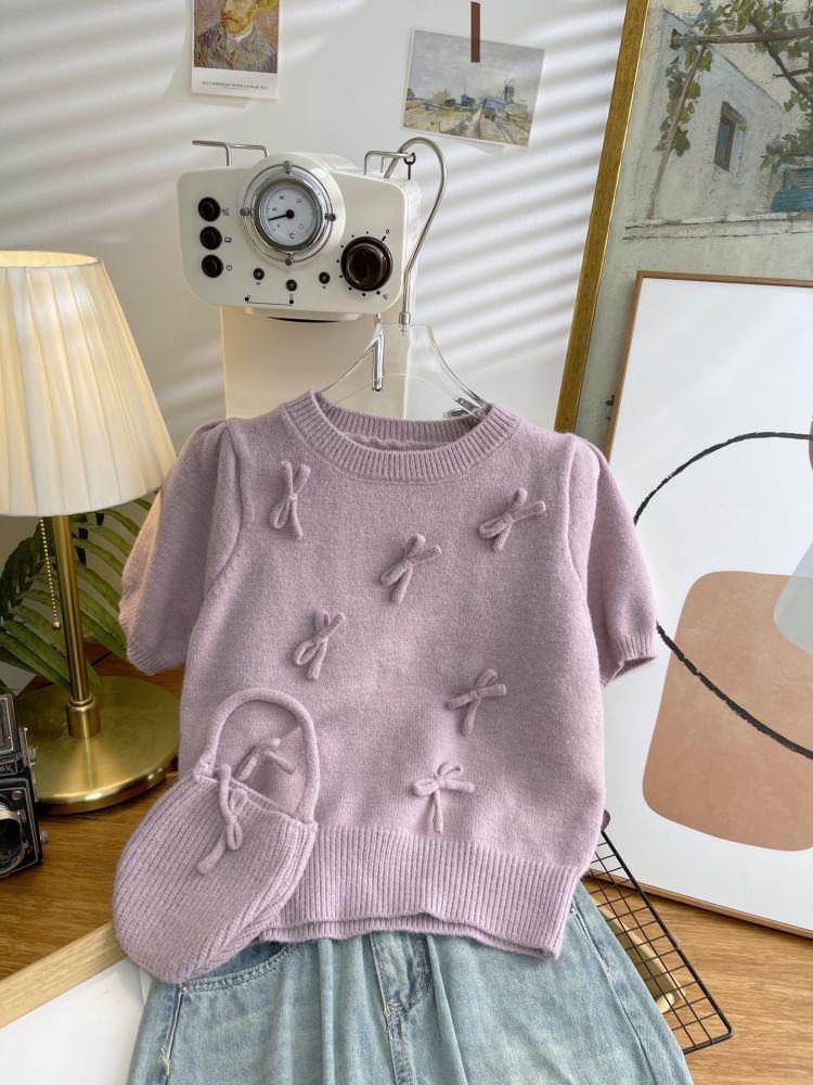 Set: Short-Sleeve Crew Neck Plain Bow Accent Crop Knit Top + Handbag Product Image
