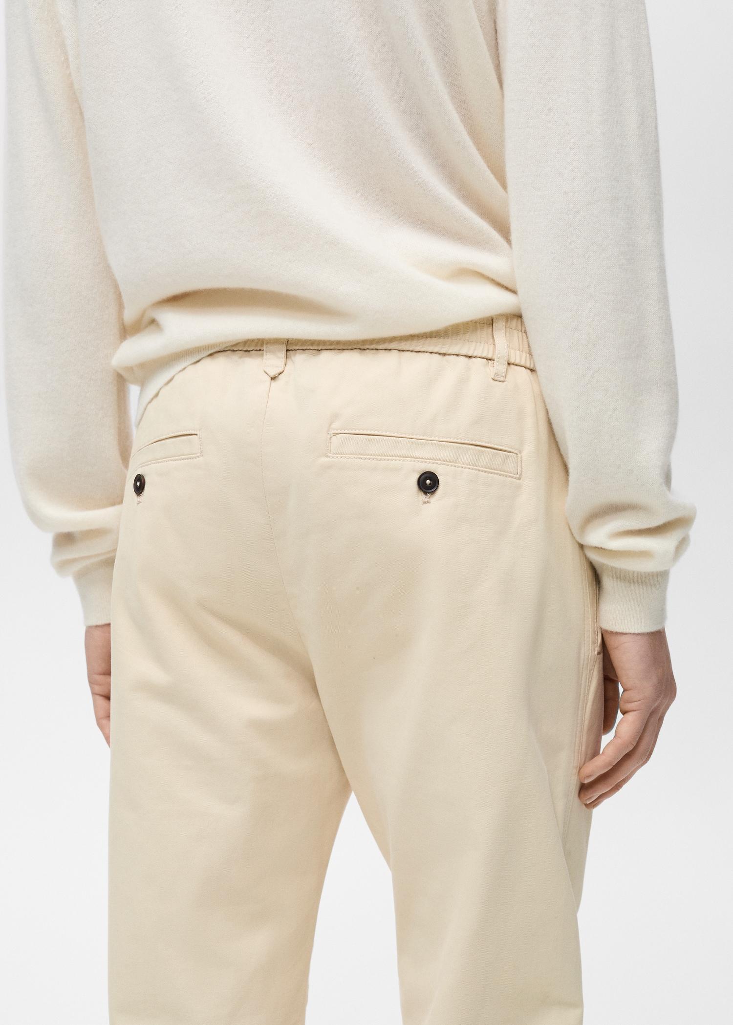 Regular-fit cotton pants with drawstring - Men | MANGO USA Product Image