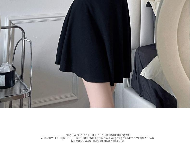 Set: Long-Sleeve Half-Zip Striped Swimsuit + Plain Swim Skirt Product Image