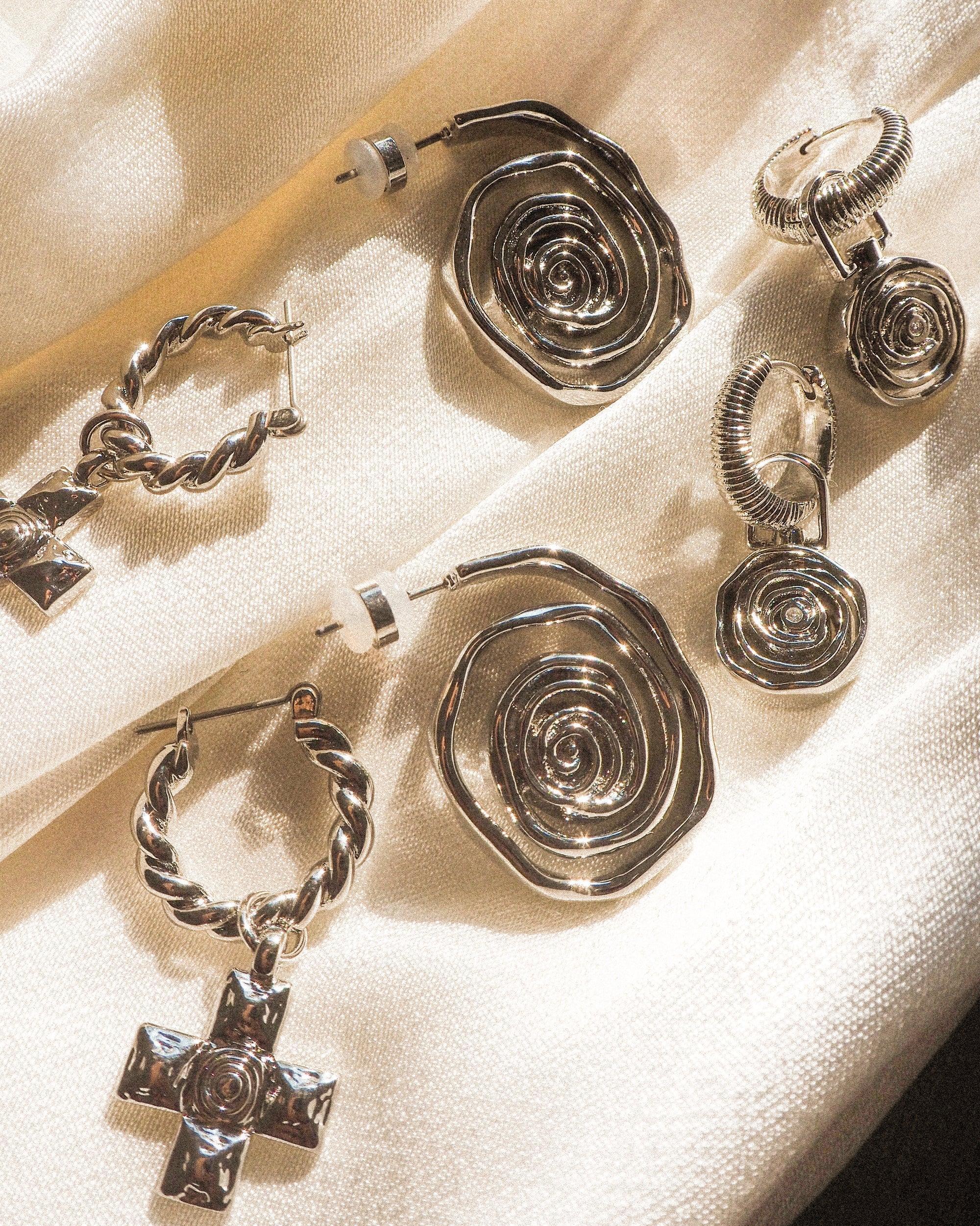 LUV AJ | Molten Cross Twisted Hoop Earrings Product Image