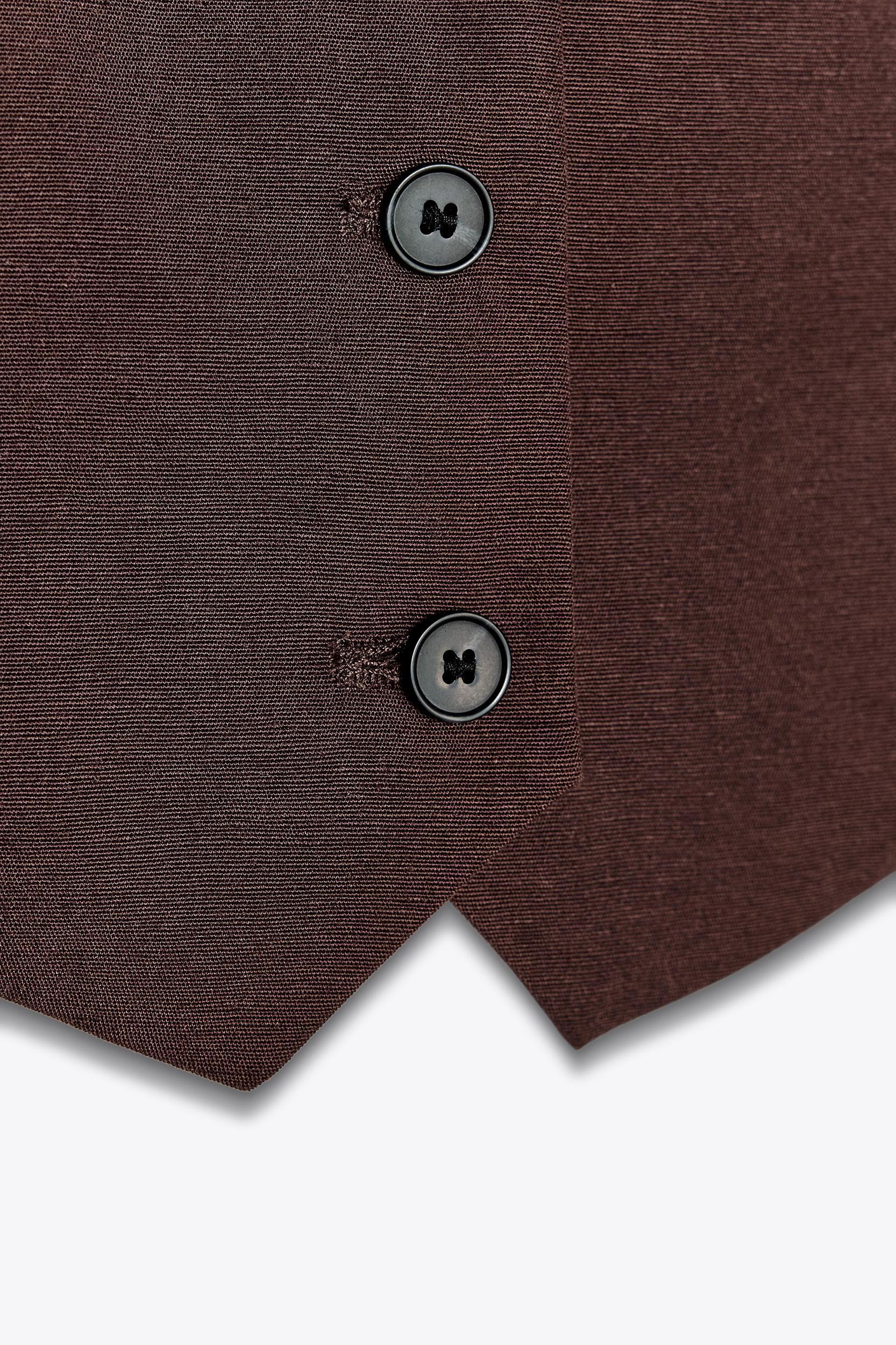 CUT OUT BACK VEST Product Image