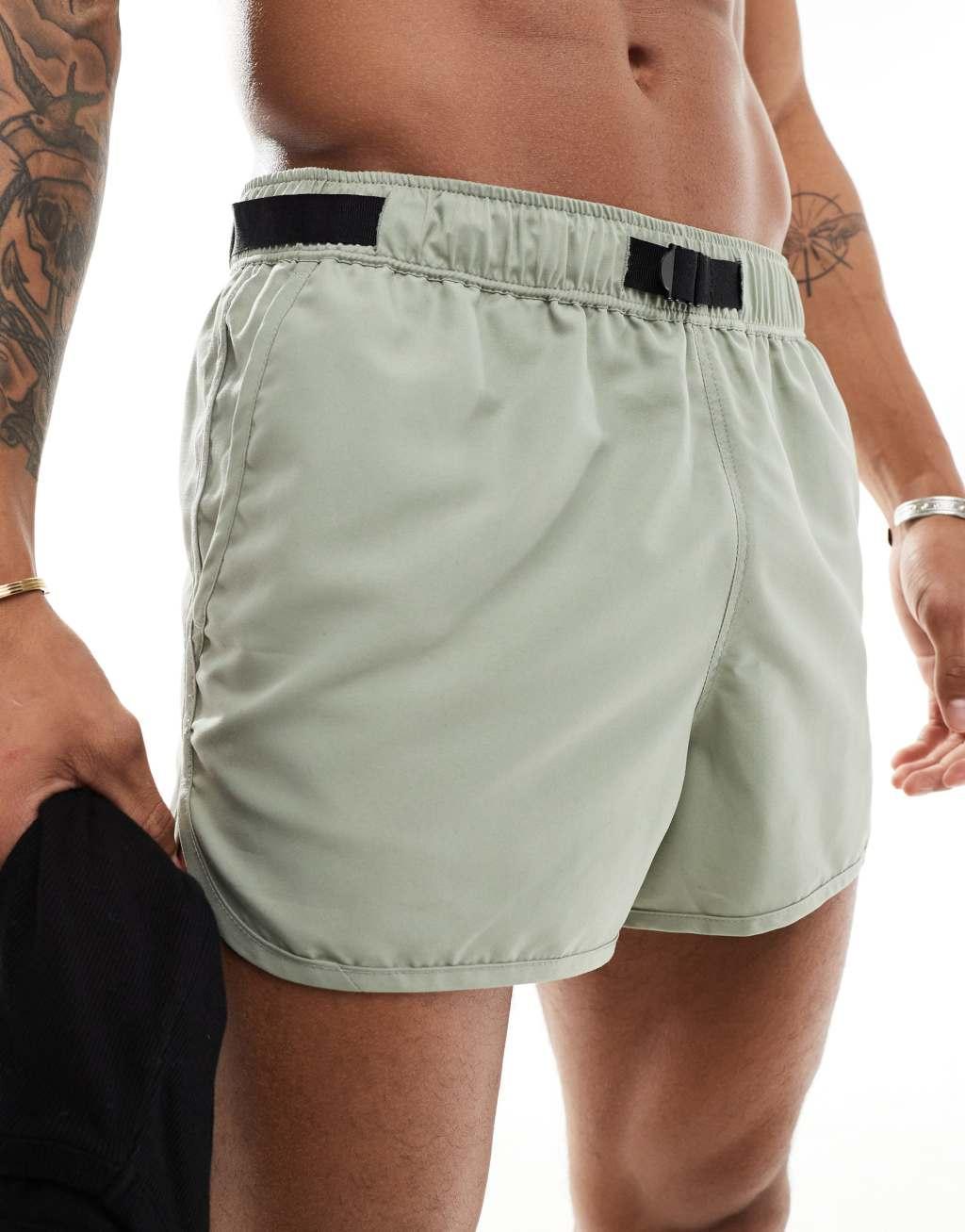 ASOS DESIGN swim shorts in short length in sage with webbed belt Product Image