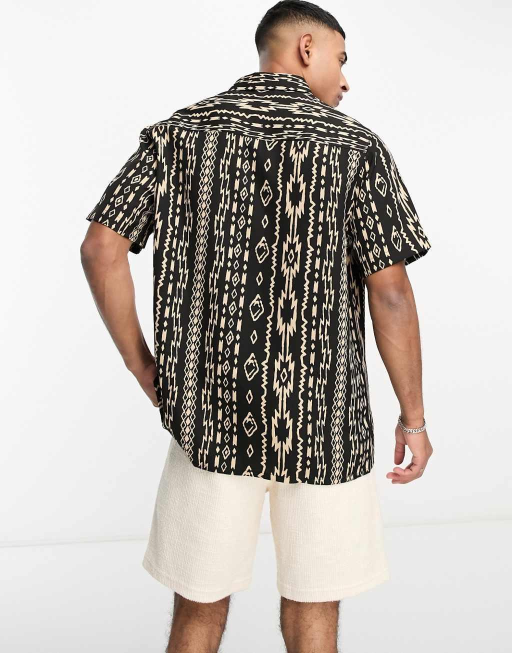 ASOS DESIGN relaxed shirt in black pattern print Product Image