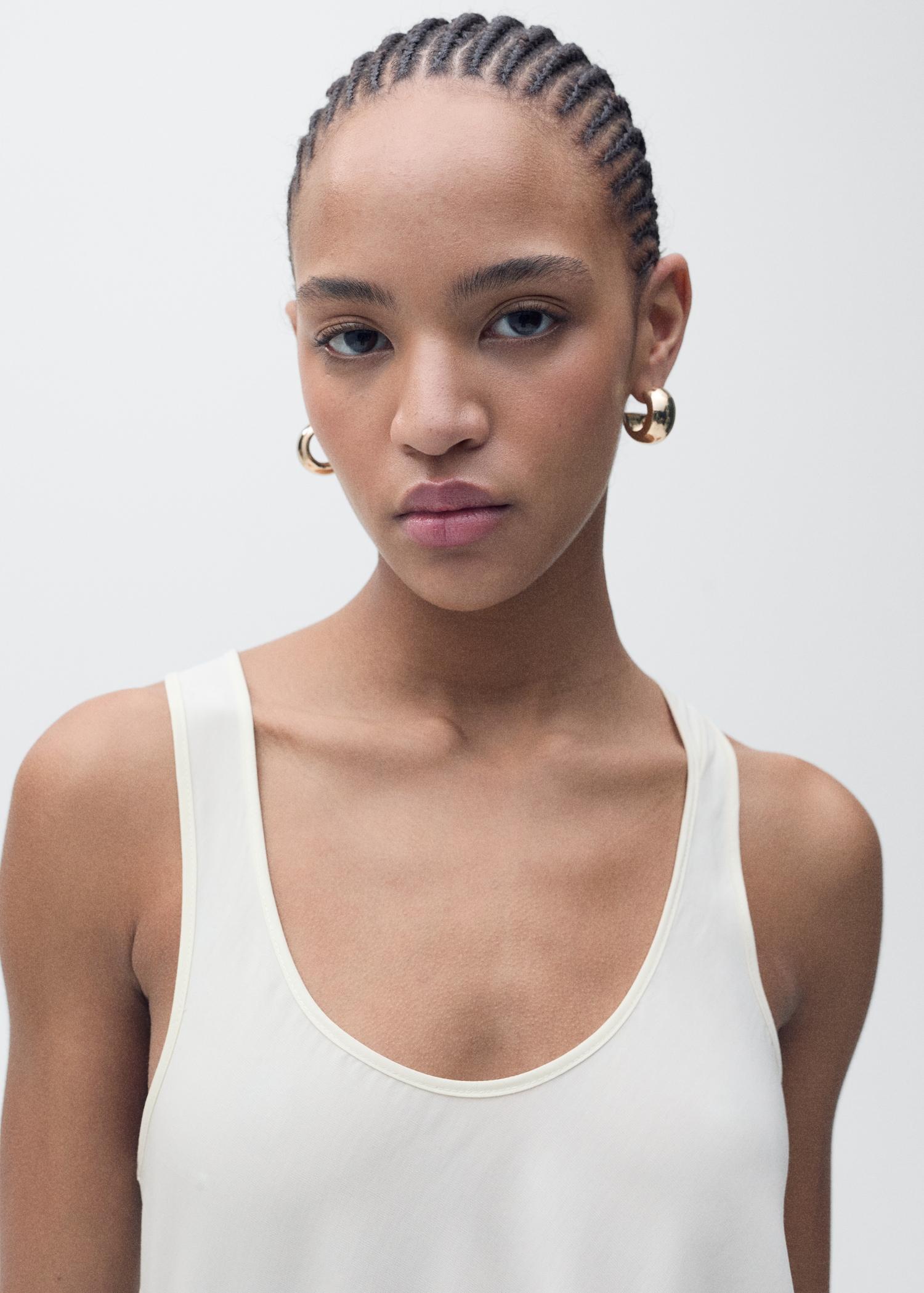 Asymmetrical lyocell top - Women | MANGO USA Product Image