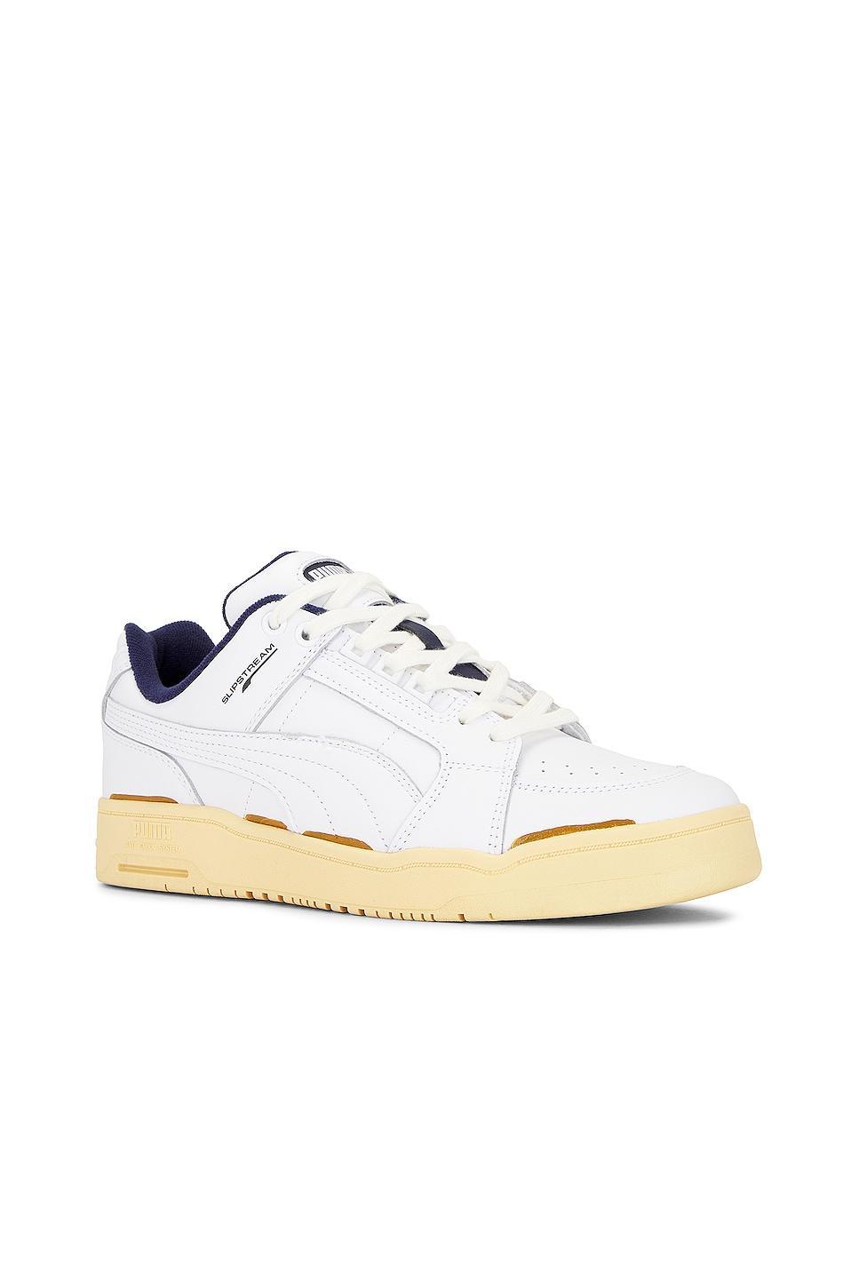 Puma Select Slipstream Lo The Neverworn Ii Sneaker in White  New Navy  & Light Straw - White. Size 8 (also in ). Product Image