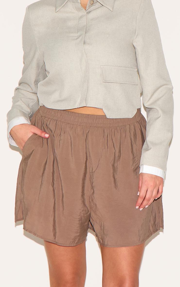 Plus Brown Peached Woven Elasticated Waist Shorts Product Image
