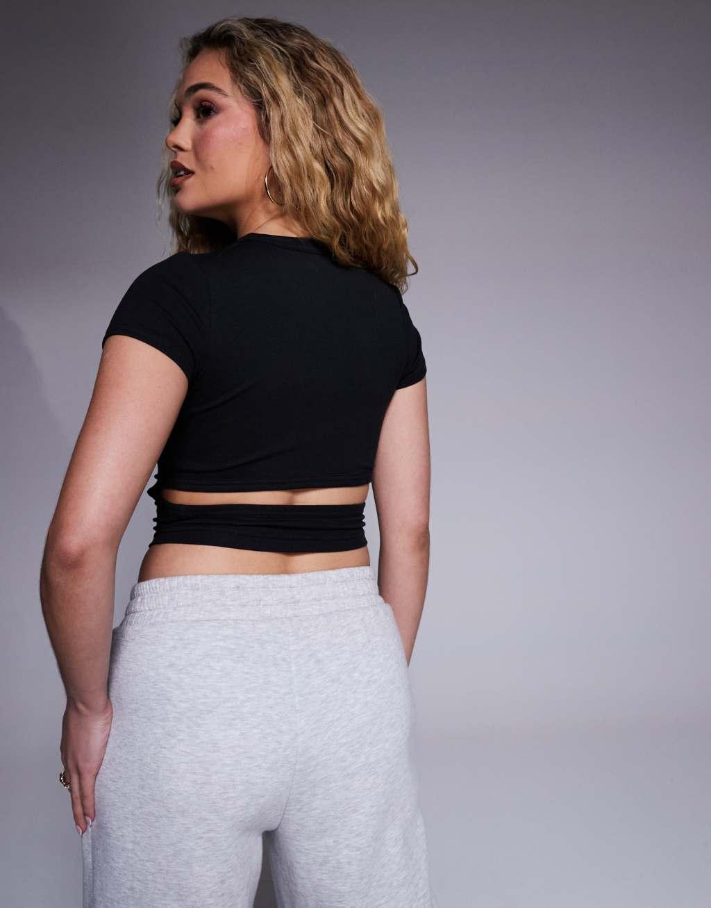 Nike Chill ribbed T-shirt with cut-out back in black Product Image