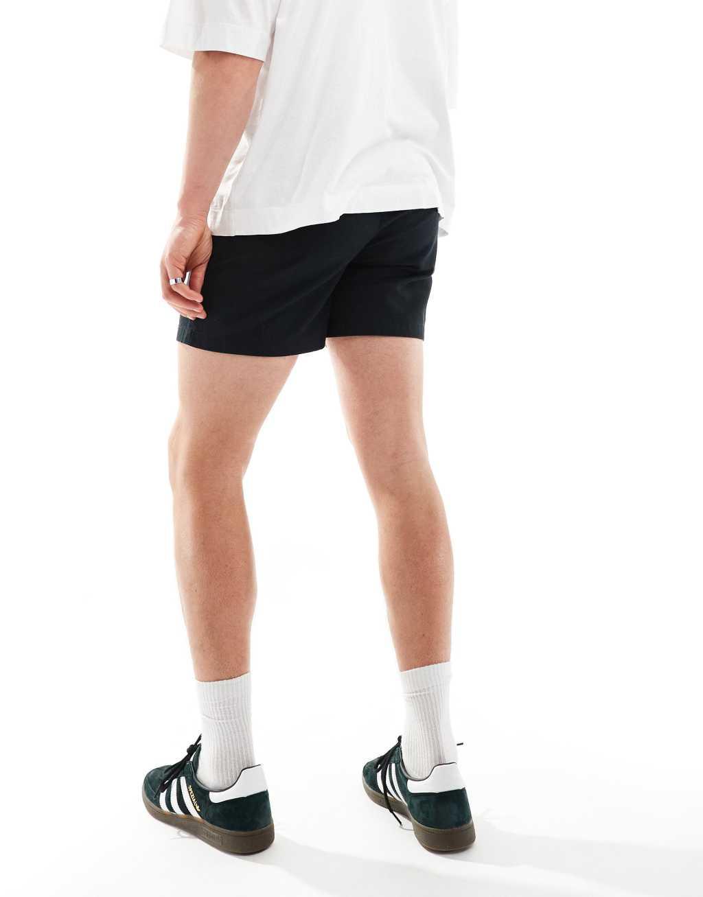 ASOS DESIGN pleated chino shorts in black Product Image