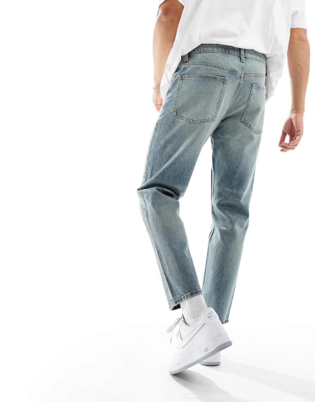 ASOS DESIGN tapered fit jeans in vintage light blue wash  Product Image