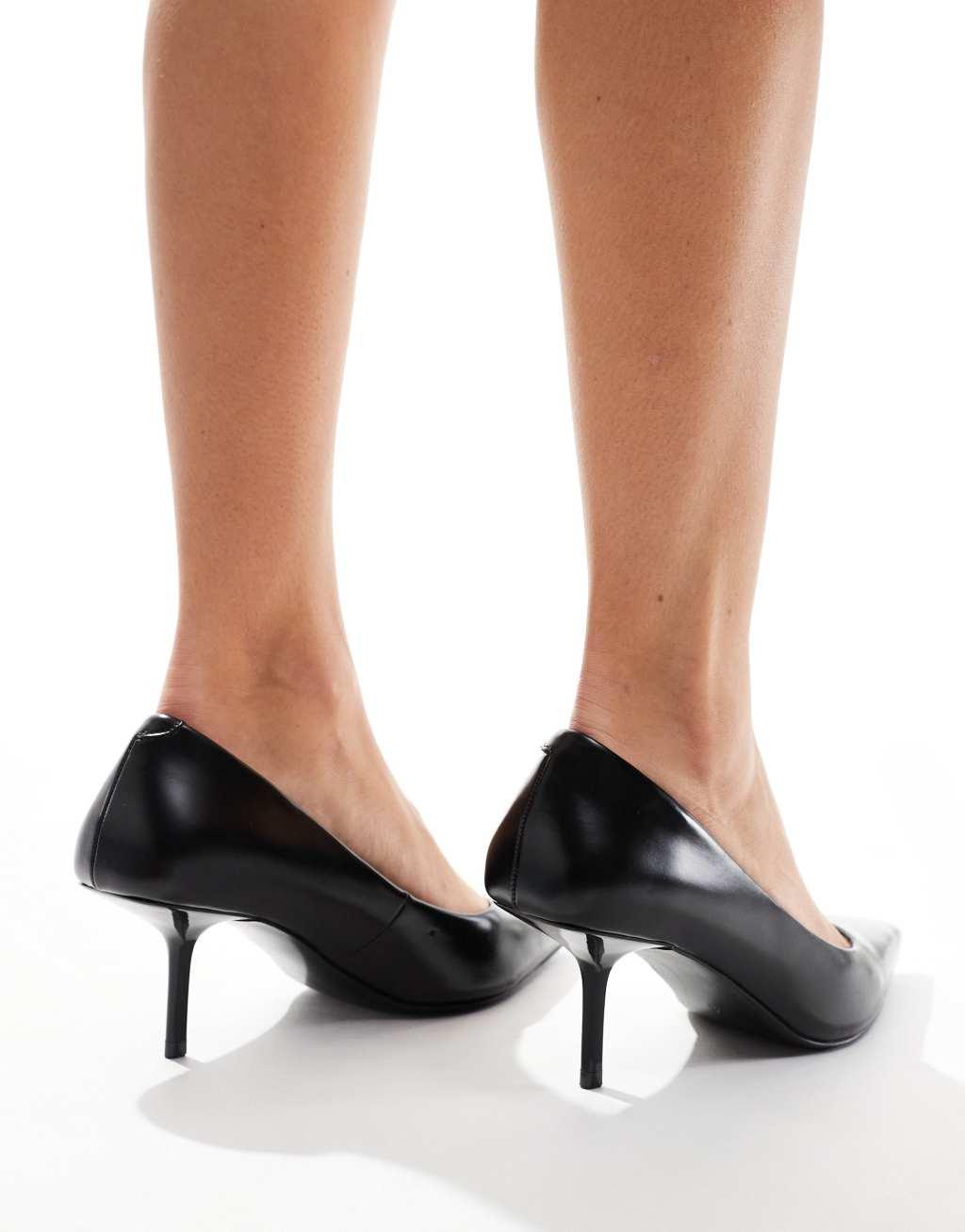 ASOS DESIGN Snatched pointed mid heeled pumps in black Product Image
