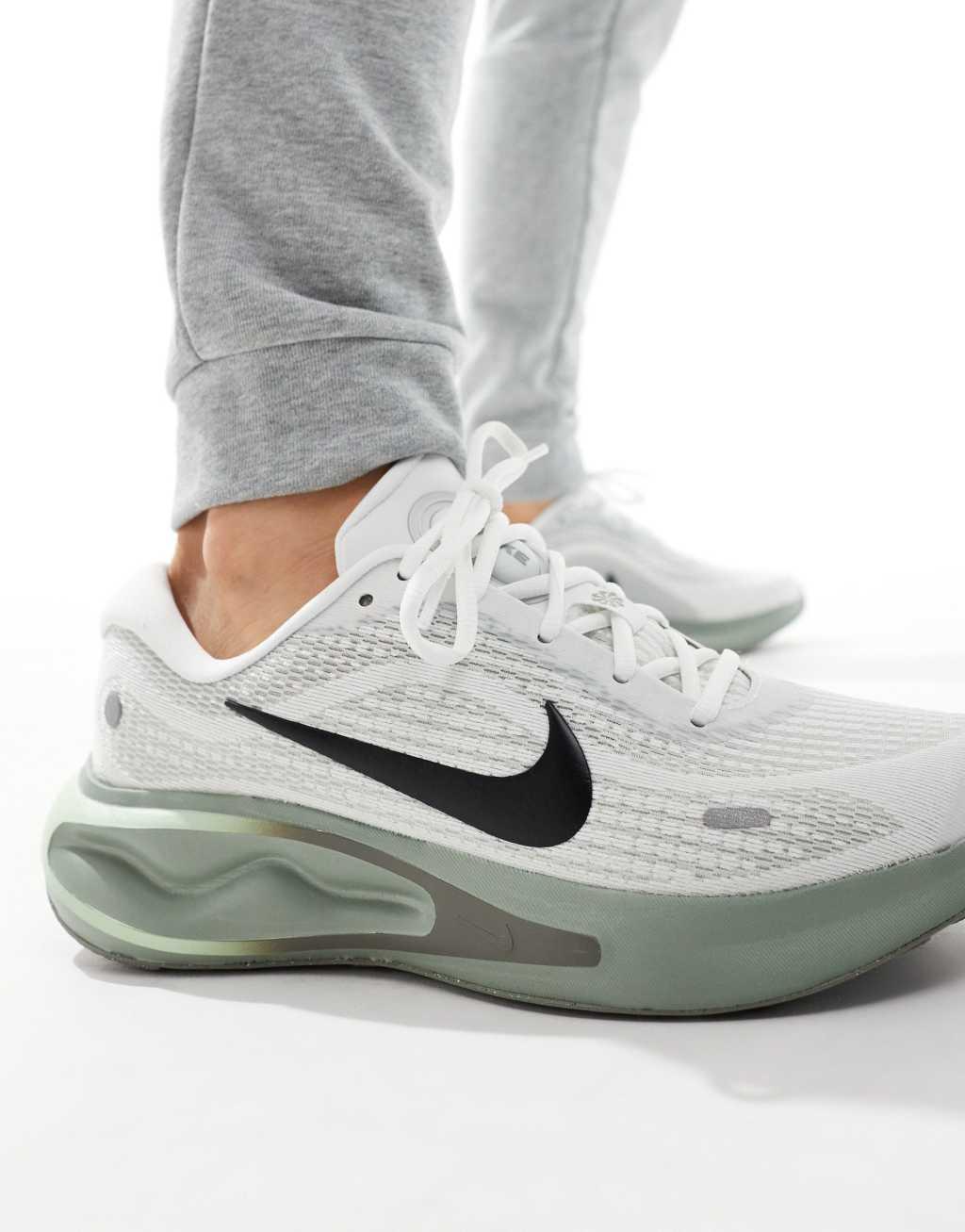 Nike Running Journey Run sneakers in white and light green Product Image